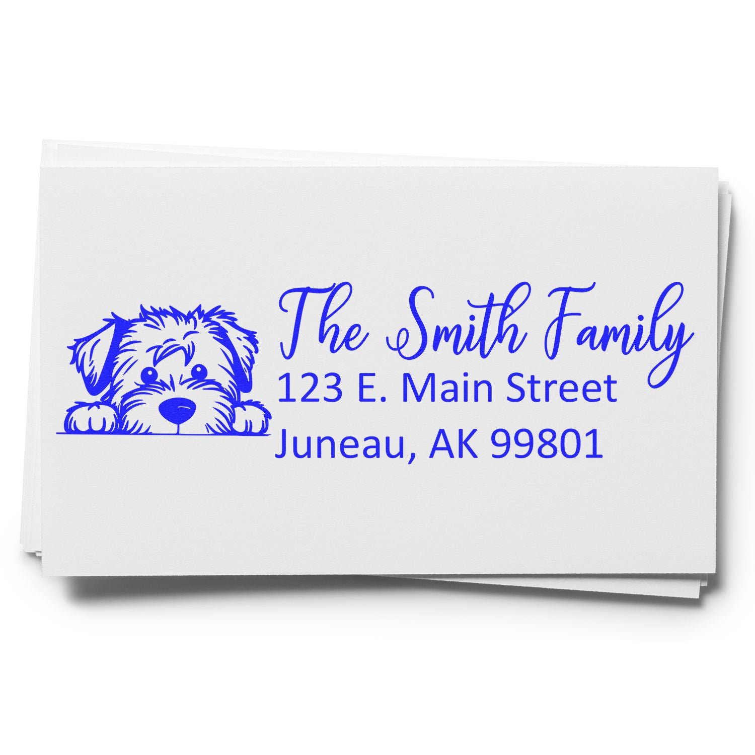 Custom rubber address stamp with dog illustration for The Smith Family, 123 E. Main Street, Juneau, AK 99801