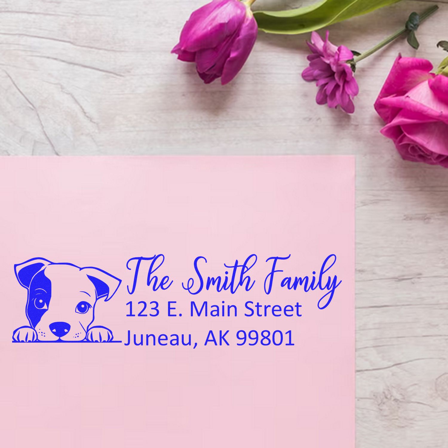 Custom return address rubber stamp with dog logo for The Smith Family, Juneau, AK.