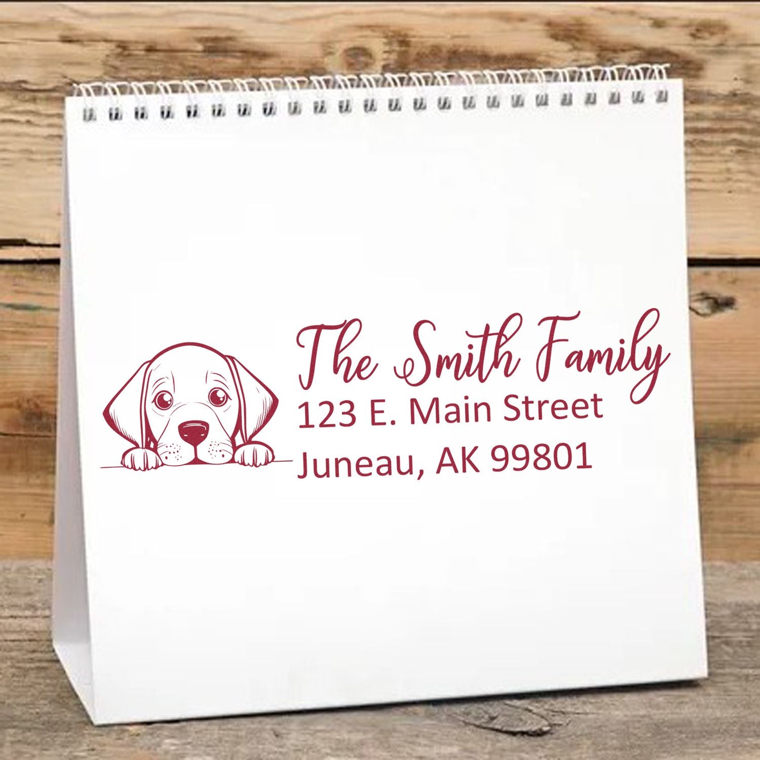 Custom dog return address rubber stamp with family name and mailing address for personalized envelopes and gift bags.