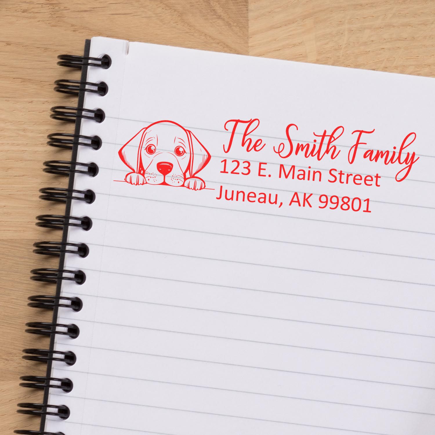Custom return address rubber stamp with puppy illustration for personalized mailing and stationery.