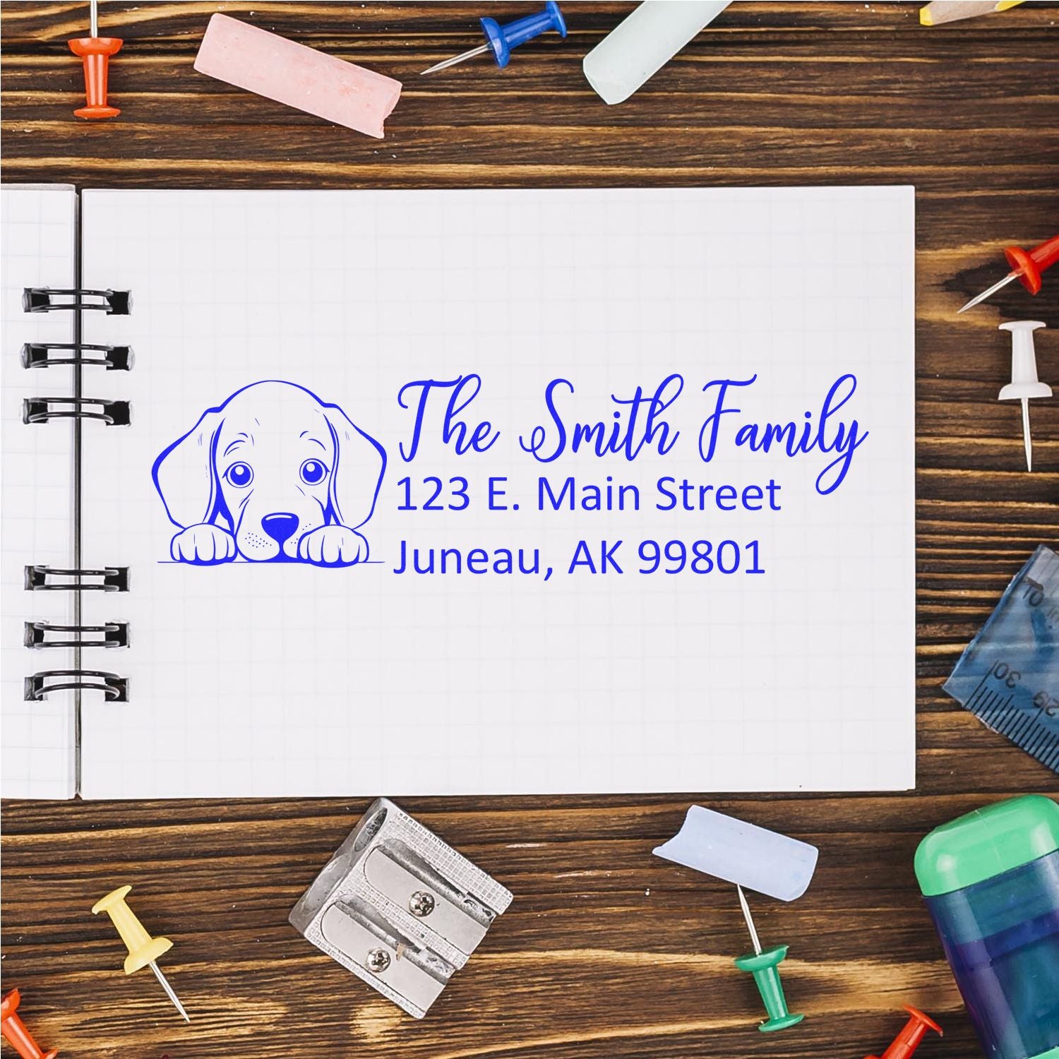 Personalized address rubber stamp with dog illustration for The Smith Family, ideal for mailing and return labels.