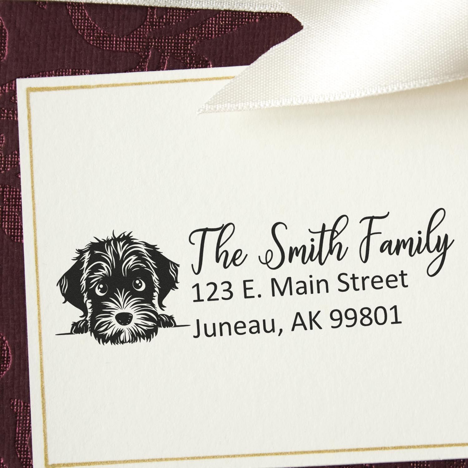 Personalized dog return address rubber stamp for The Smith Family, with custom name and Juneau, AK address.