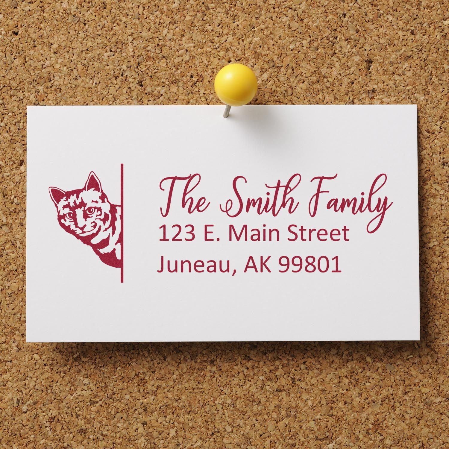 Custom rubber address stamp with cat design for The Smith Family, featuring personalized return address in Juneau, AK 99801.