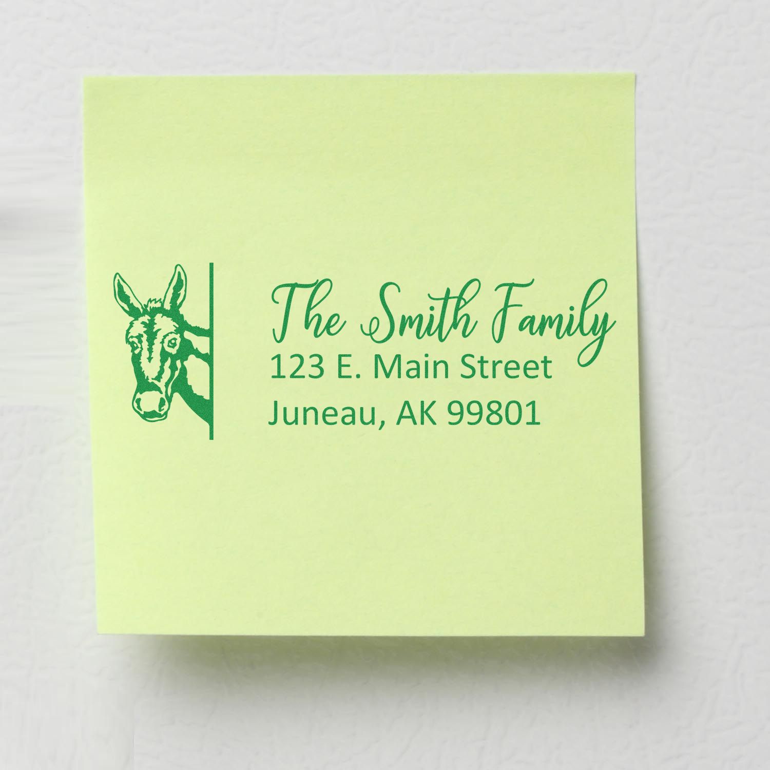 Custom family address rubber stamp with donkey design, featuring The Smith Family and Juneau, AK return address.