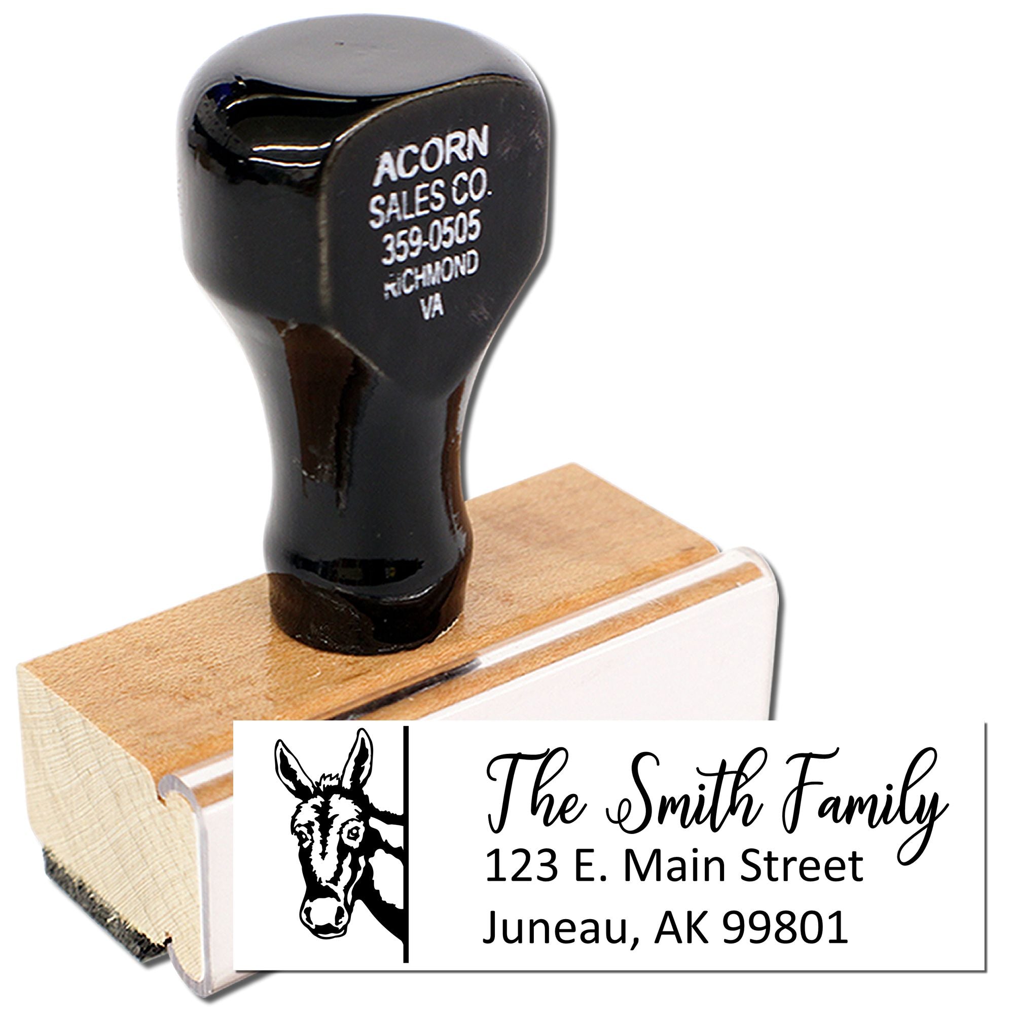 Custom return address rubber stamp with donkey logo, family name, and address for personalized mailing and branding.