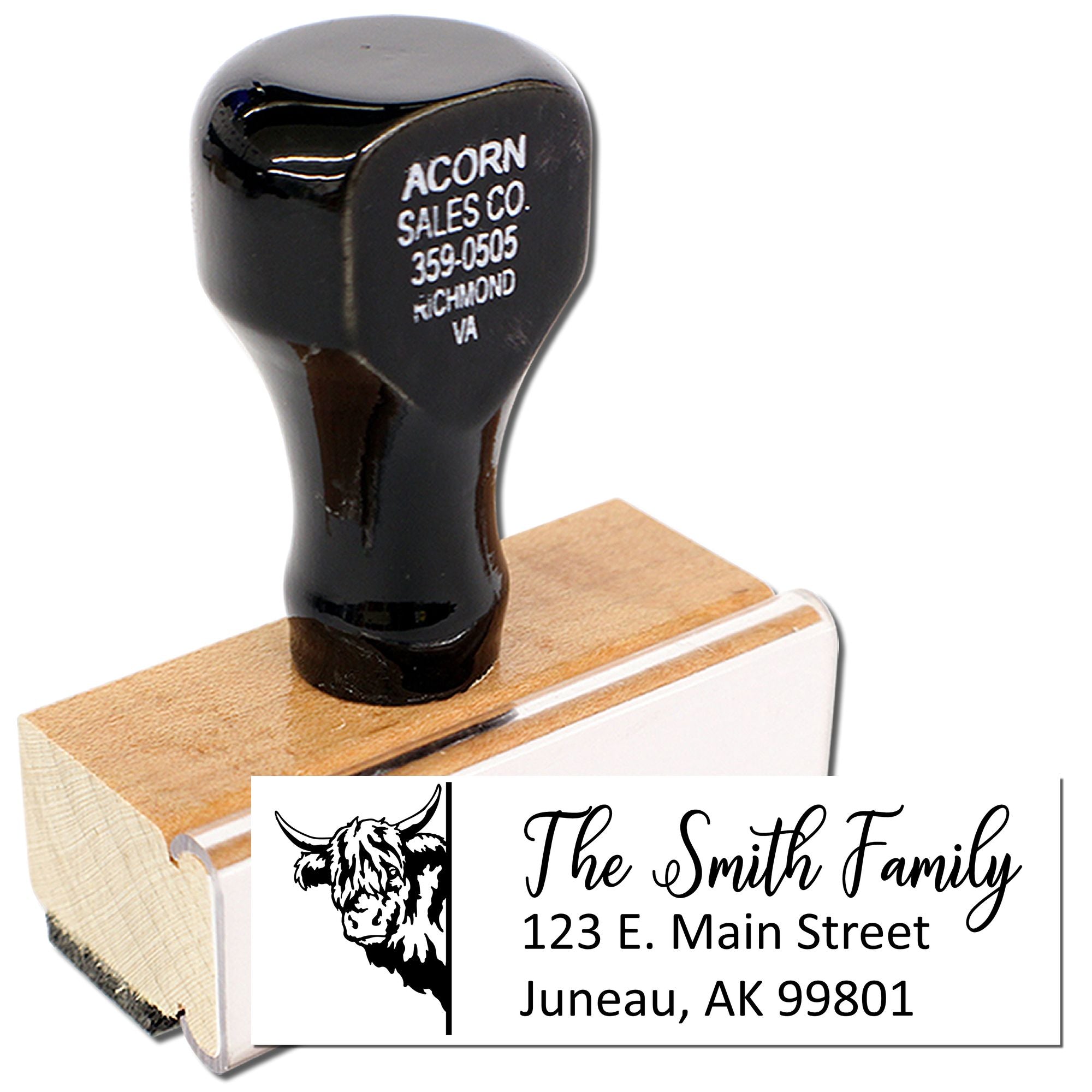 Custom family address rubber stamp with Highland cow design and personalized name and address.