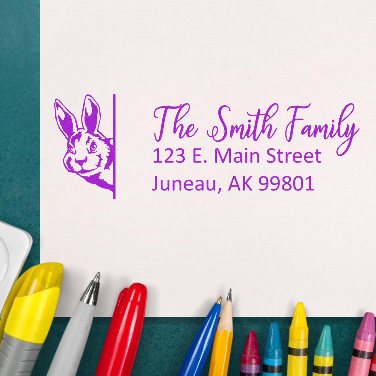 Custom rabbit address rubber stamp for The Smith Family with Juneau, AK return address.