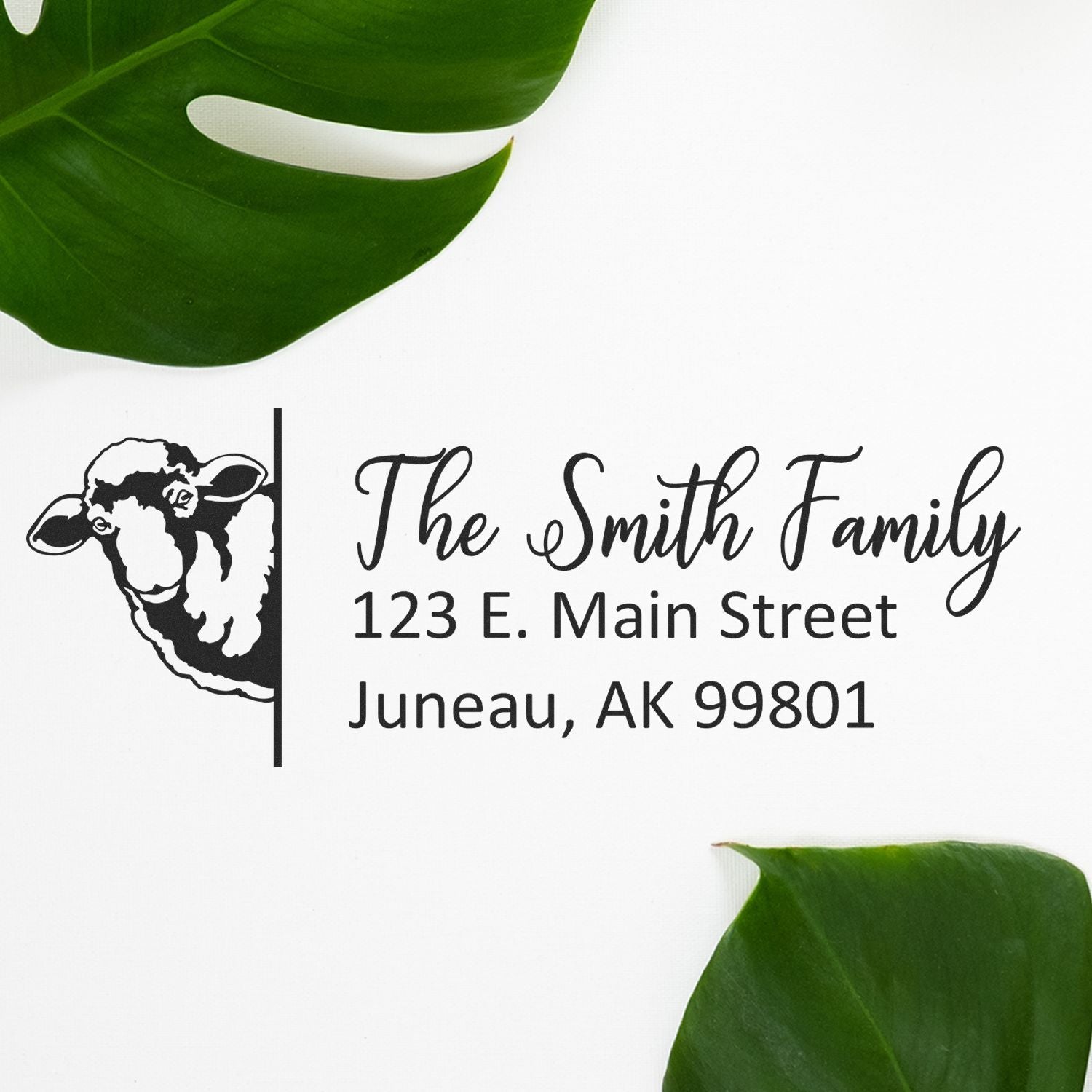 Custom return address rubber stamp with sheep design, The Smith Family, and Juneau, AK 99801.