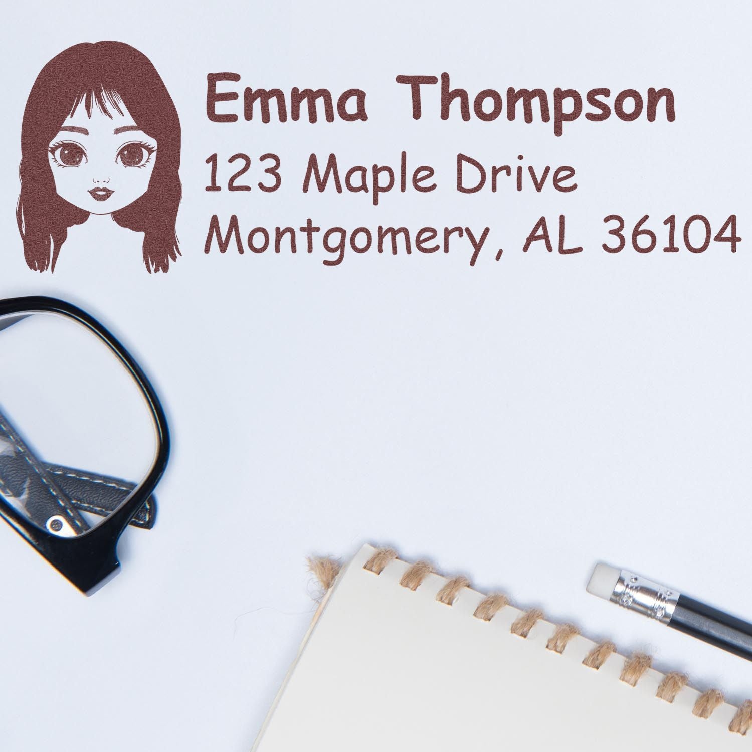 Personalized address rubber stamp with girl illustration, Emma Thompson name, and Montgomery, AL return address.