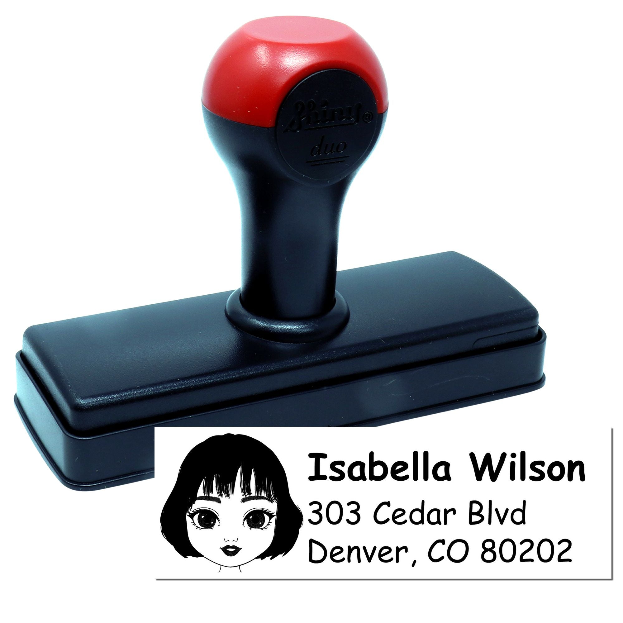 Personalized self-inking rubber address stamp with name and Denver mailing address for envelope labeling.