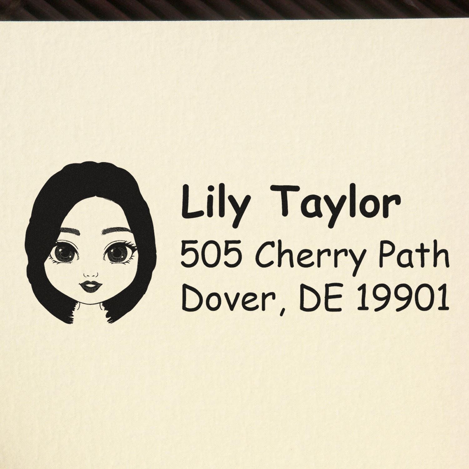 Custom address rubber stamp for Lily Taylor, 505 Cherry Path, Dover, DE 19901, with illustrated portrait.