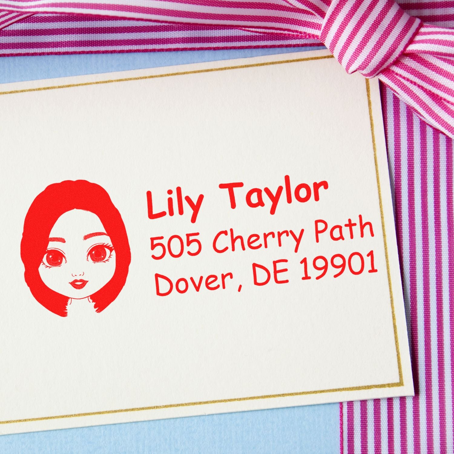 Custom rubber stamp return address on wedding stationery with red ink, personalized name and Dover, DE address.