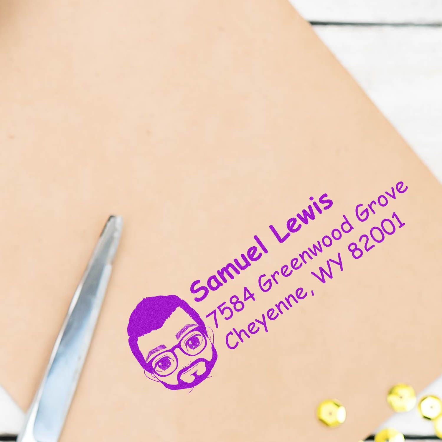 Custom address rubber stamp with portrait logo and purple ink for Samuel Lewis, Cheyenne, WY mailing envelopes.
