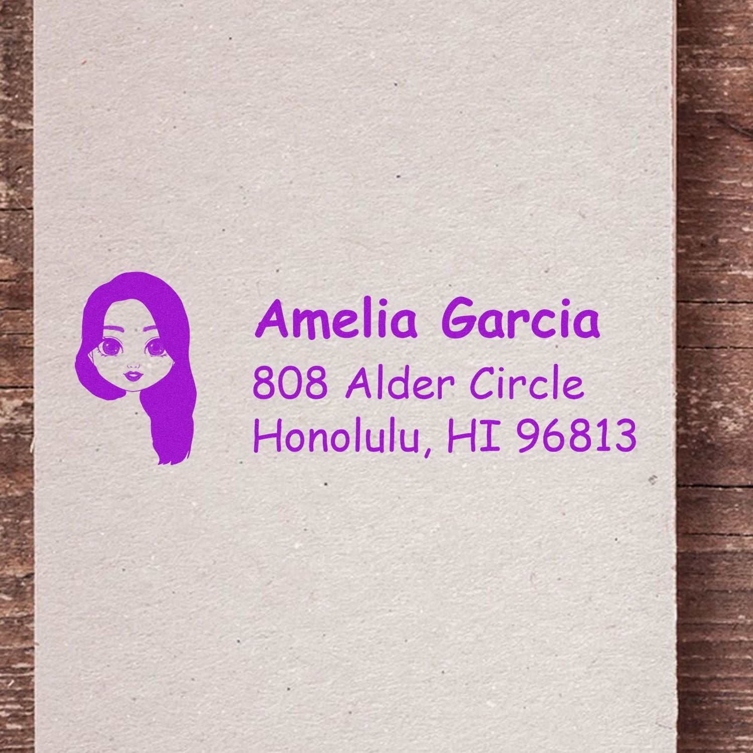 Personalized custom address rubber stamp with illustrated girl, Amelia Garcia, 808 Alder Circle, Honolulu, HI 96813.