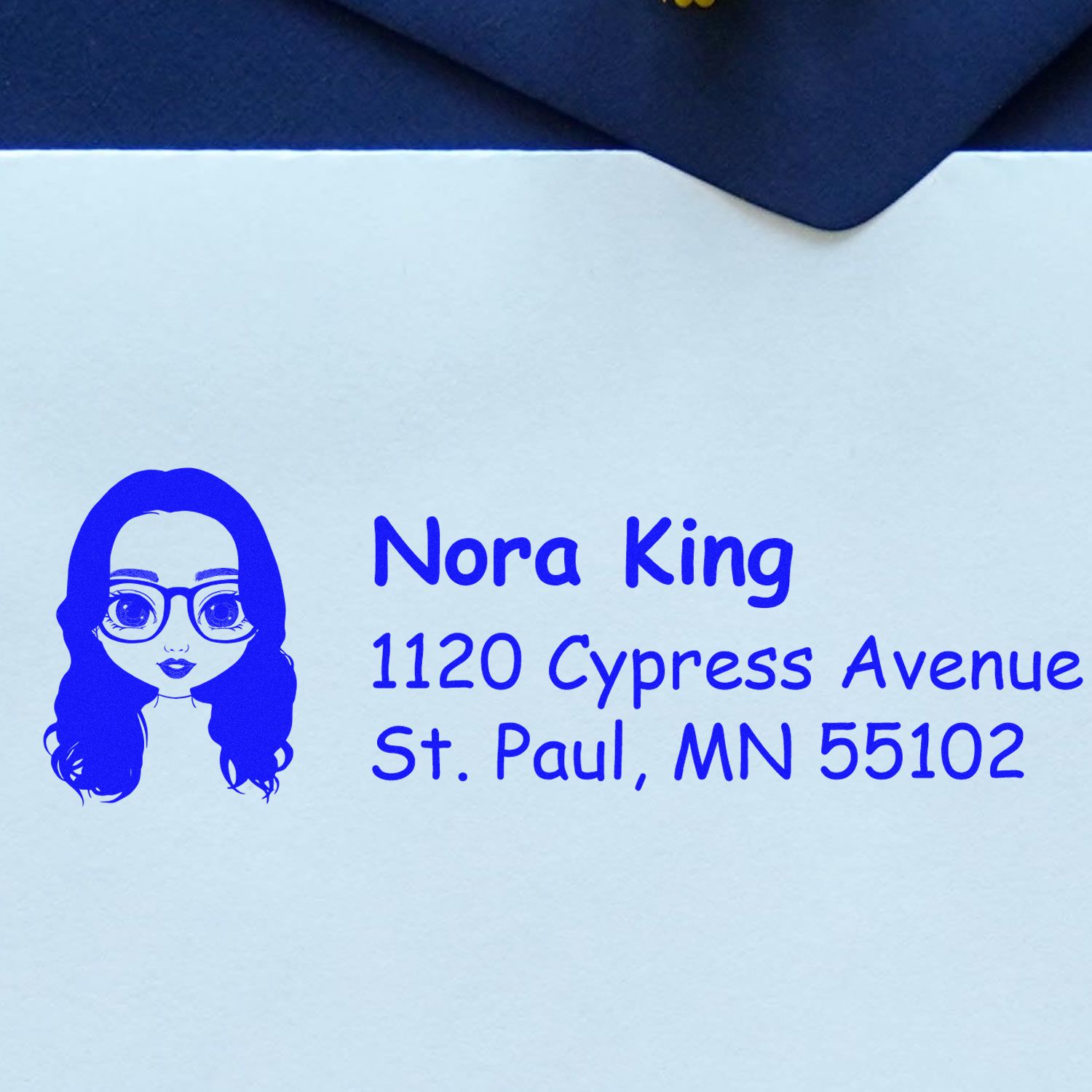 Custom return address rubber stamp with female avatar, Nora King, 1120 Cypress Avenue, St. Paul, MN 55102