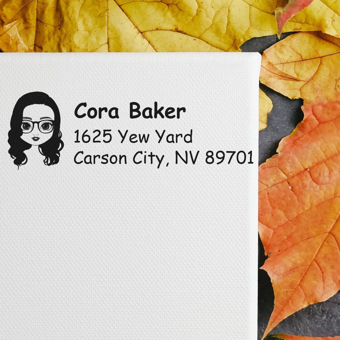 Custom rubber return address stamp for Cora Baker, featuring an avatar icon and mailing address on an envelope.