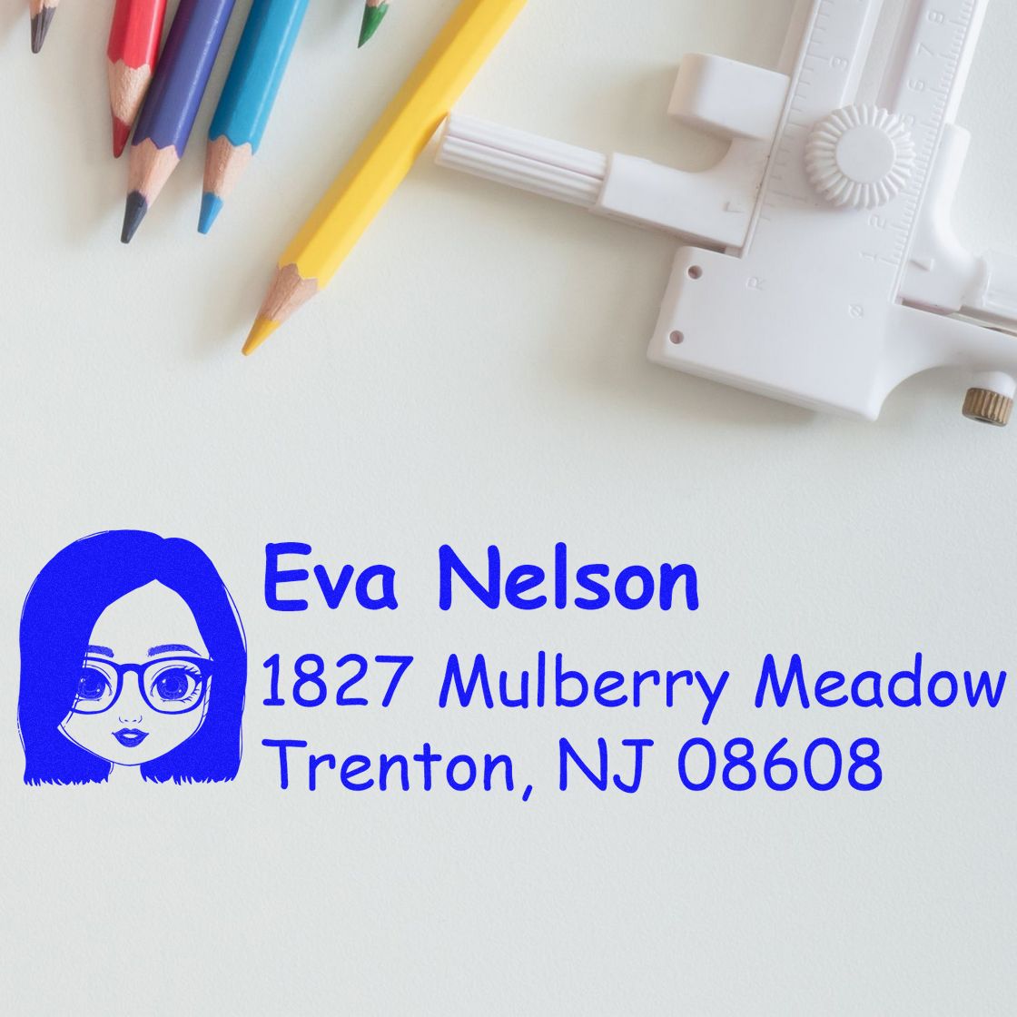Custom rubber address stamp with female avatar, Eva Nelson, 1827 Mulberry Meadow, Trenton, NJ 08608.