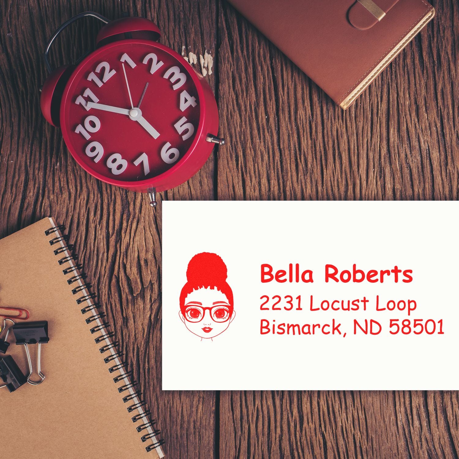 Custom self-inking rubber address stamp with Bella Roberts name and address, ideal for personalized mailing and business use.