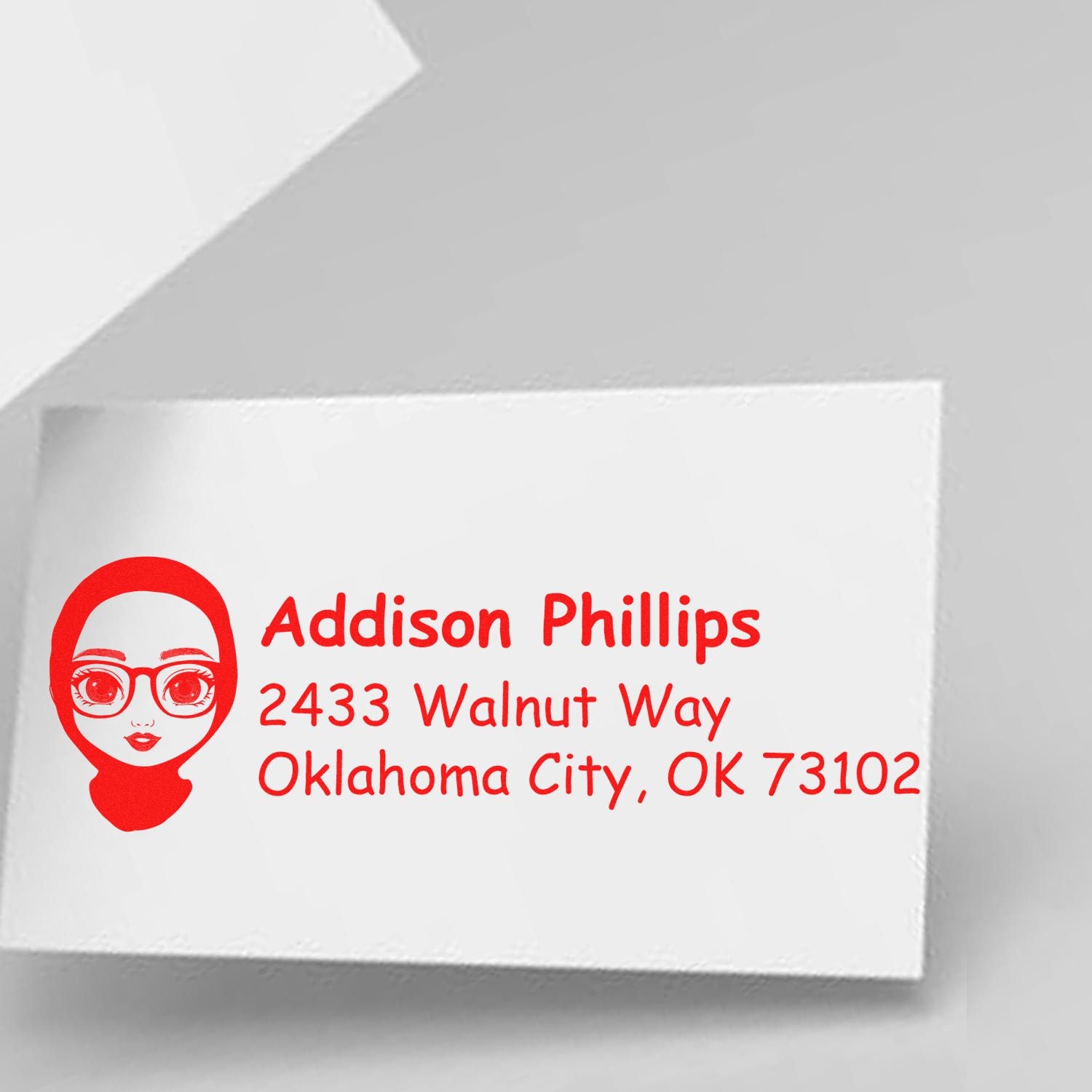 Custom rubber address stamp for Addison Phillips, 2433 Walnut Way, Oklahoma City, OK 73102, with avatar logo.