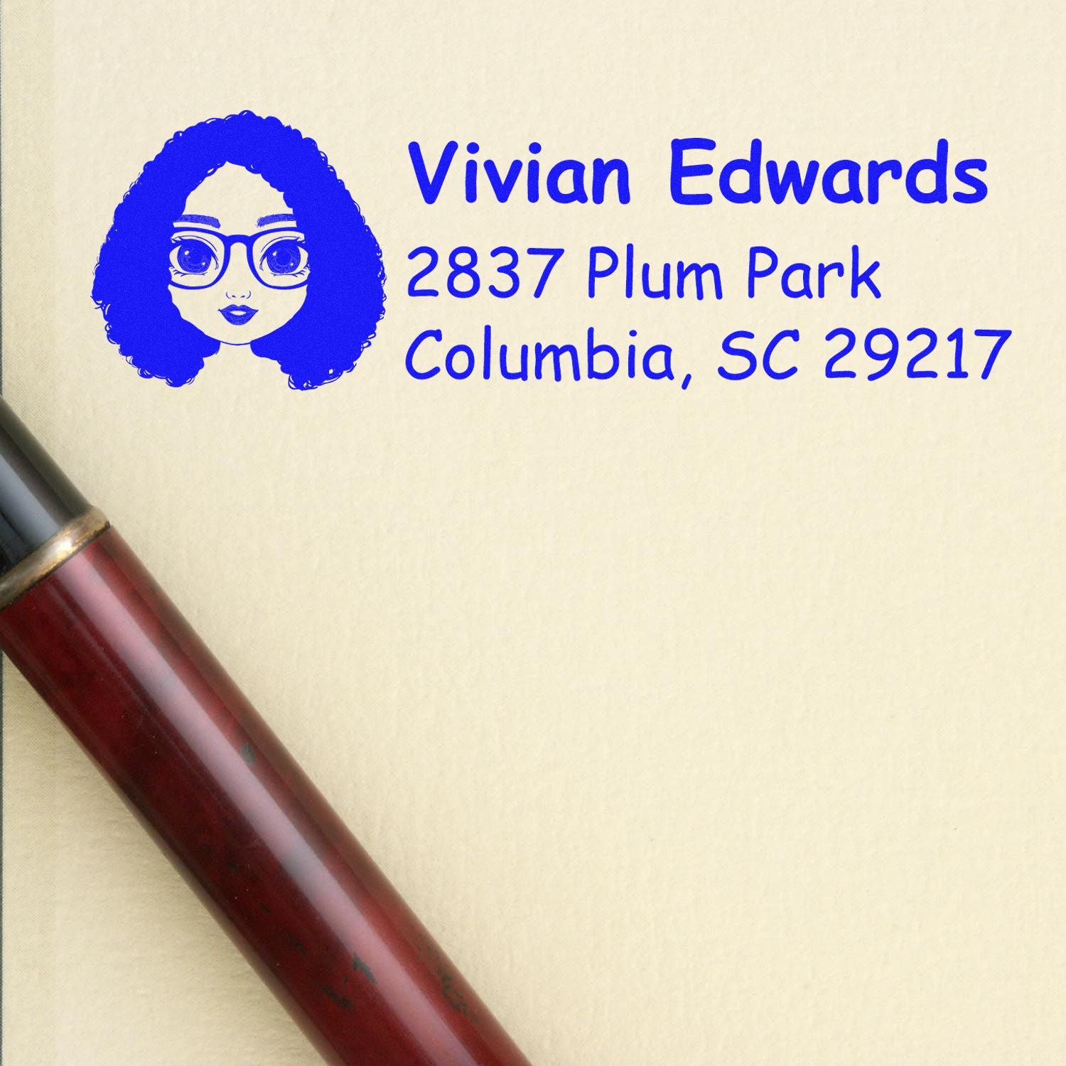 Custom rubber address stamp with avatar logo, Vivian Edwards, 2837 Plum Park, Columbia, SC 29217.