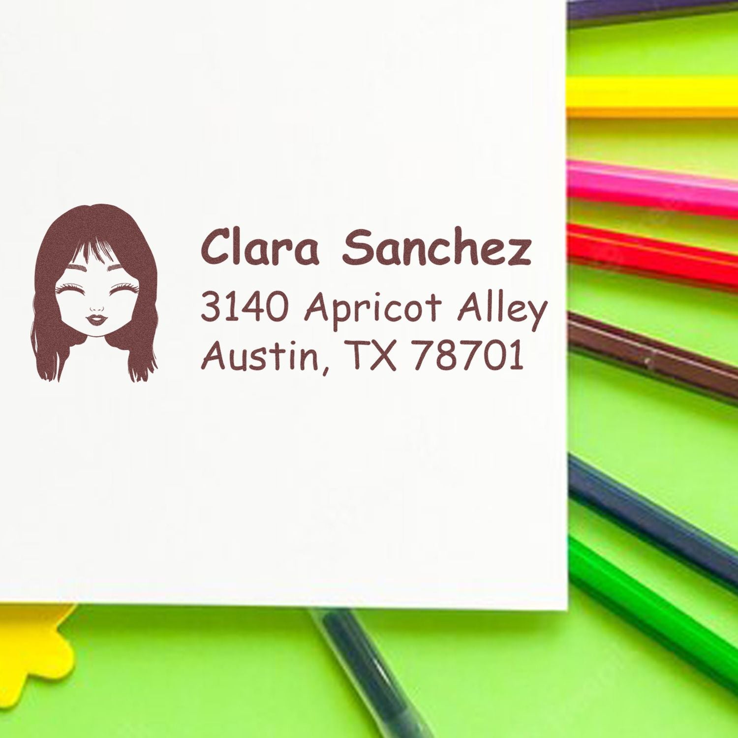 Custom rubber address stamp with female avatar, Clara Sanchez name, and Austin, TX return address.