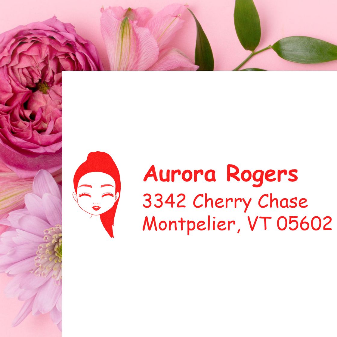 Custom return address rubber stamp with floral design, featuring Aurora Rogers, 3342 Cherry Chase, Montpelier VT 05602.