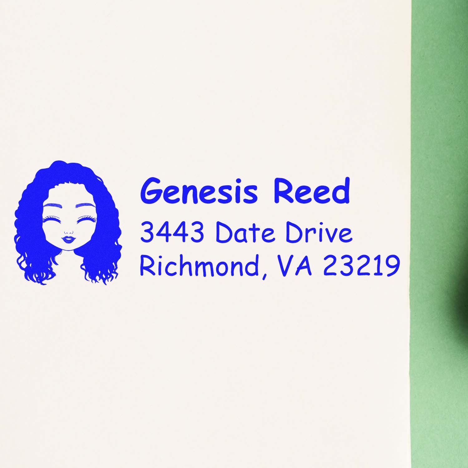 Custom rubber address stamp with name, portrait icon, and Richmond, VA mailing address in blue ink.