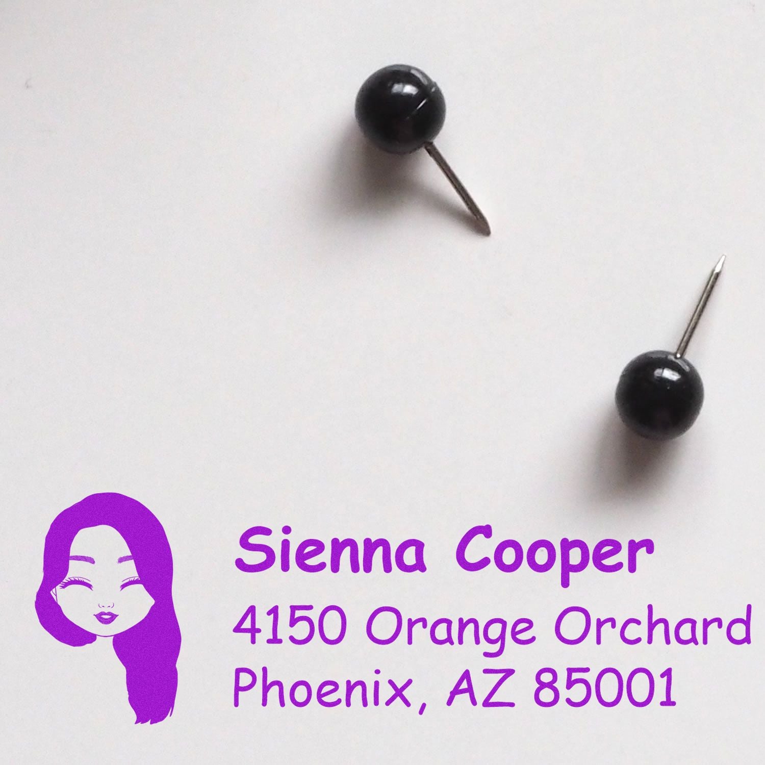Custom address rubber stamp with logo for Sienna Cooper, Phoenix AZ, in purple ink.
