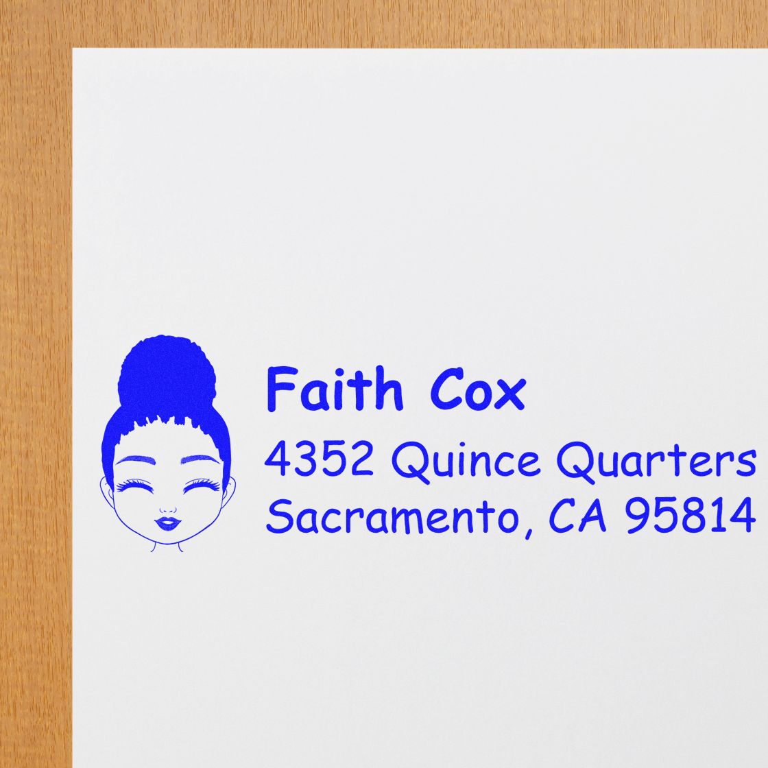 Custom return address rubber stamp with female avatar, name, and Sacramento, CA address for mailing envelopes.