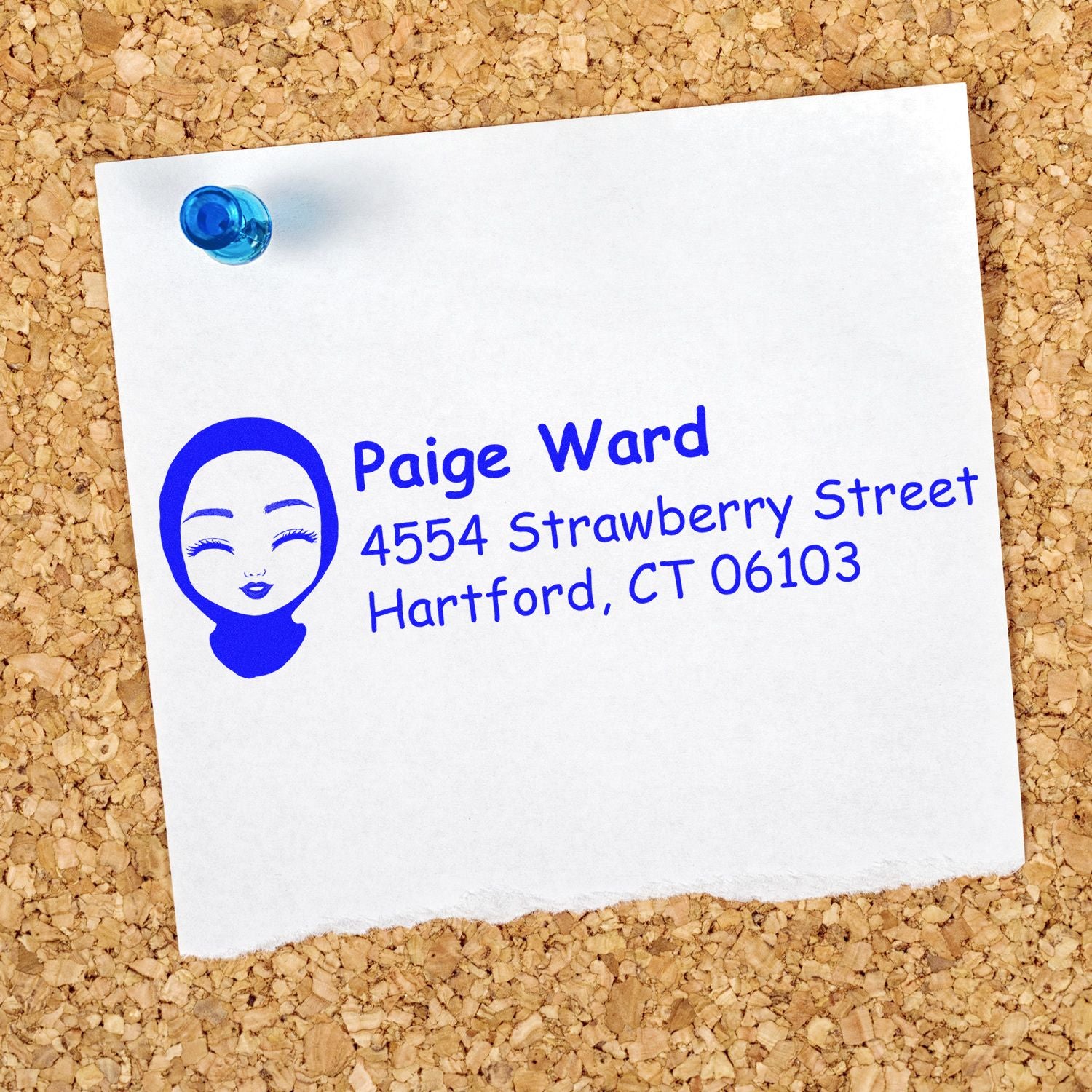 Custom blue rubber address stamp with name and Hartford, CT 06103 mailing address on a pinned paper note.