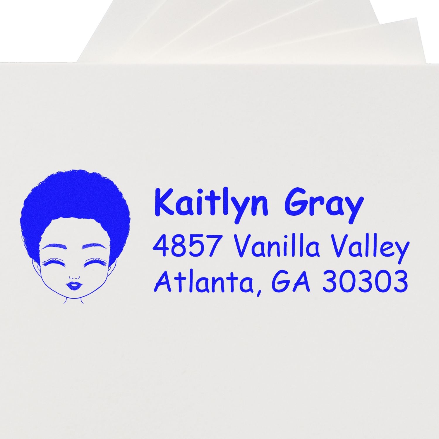 Custom return address rubber stamp with personalized name, address, and logo for mailing envelopes.