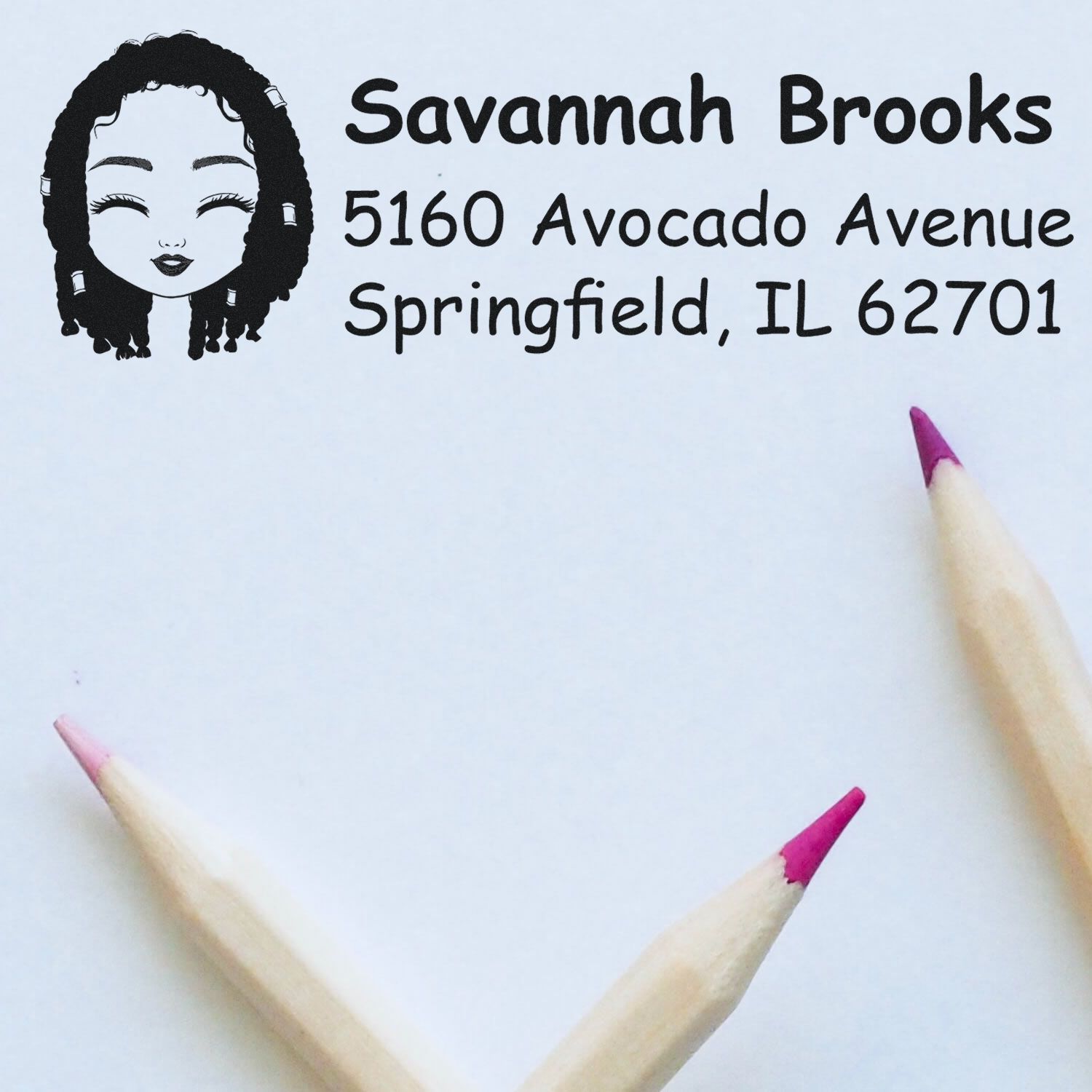 Custom address rubber stamp with illustrated face logo for Savannah Brooks, 5160 Avocado Avenue, Springfield, IL 62701