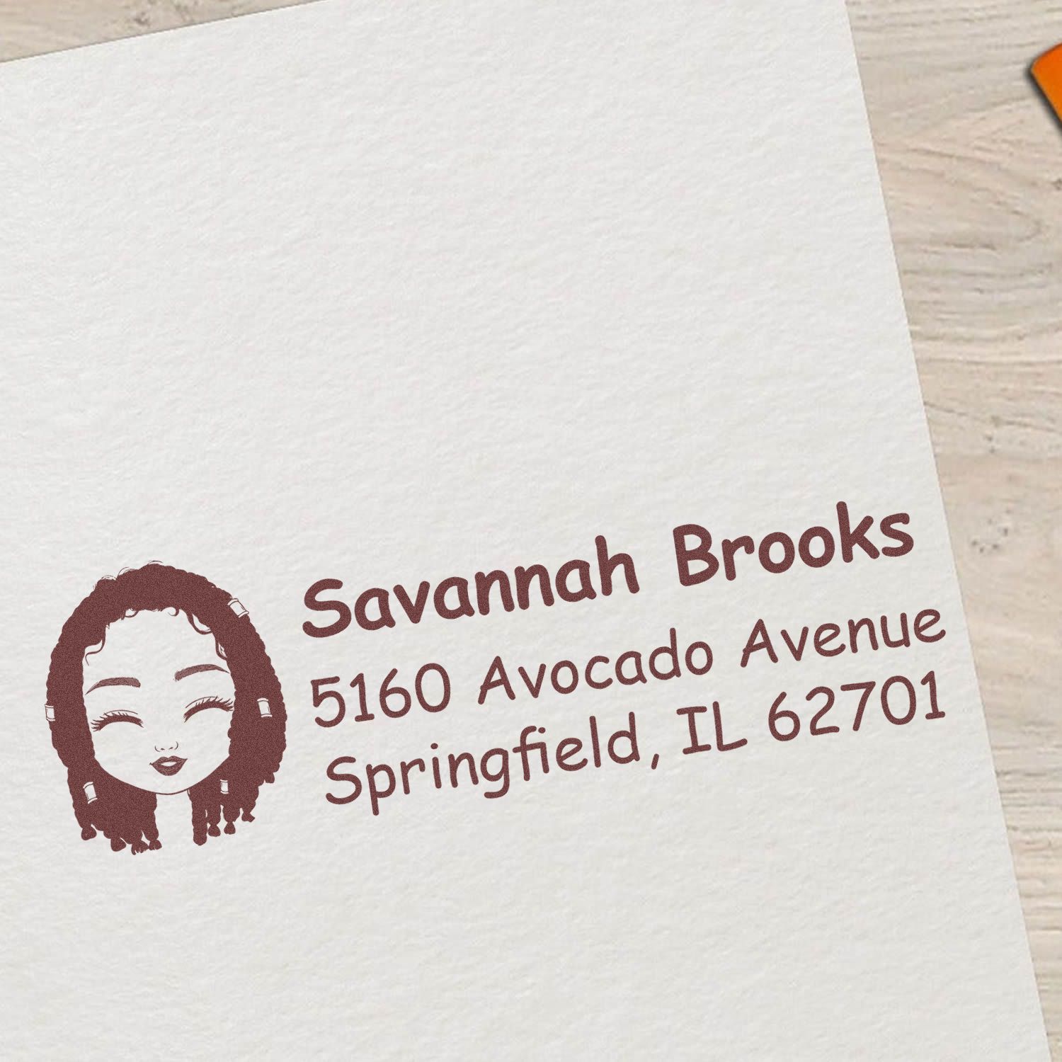 Personalized rubber return address stamp with portrait icon for Savannah Brooks, 5160 Avocado Avenue, Springfield, IL