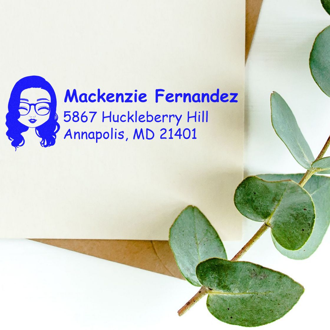 Custom return address rubber stamp with woman avatar for envelopes, featuring Mackenzie Fernandez, Annapolis, MD.
