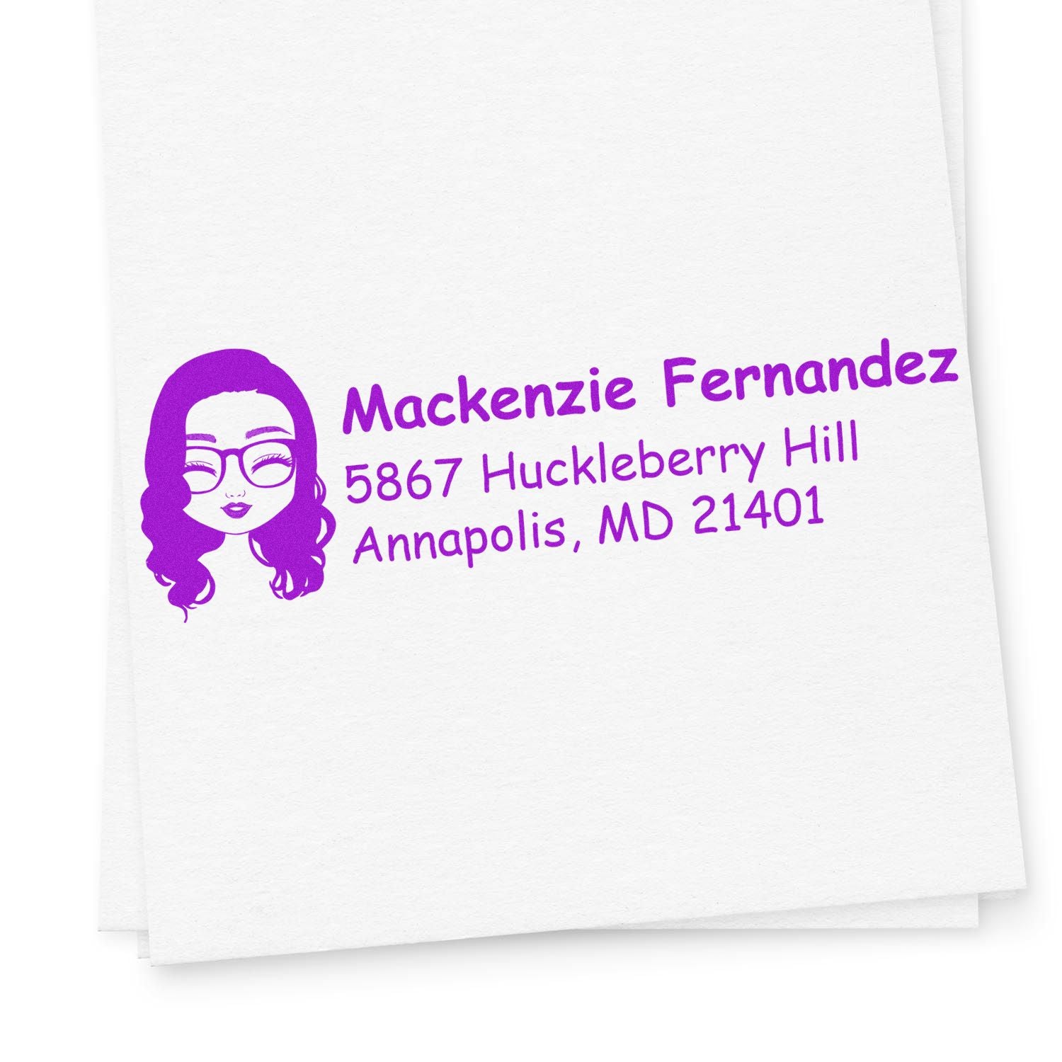 Custom return address rubber stamp with female avatar, Mackenzie Fernandez, and Annapolis, MD address in purple ink.