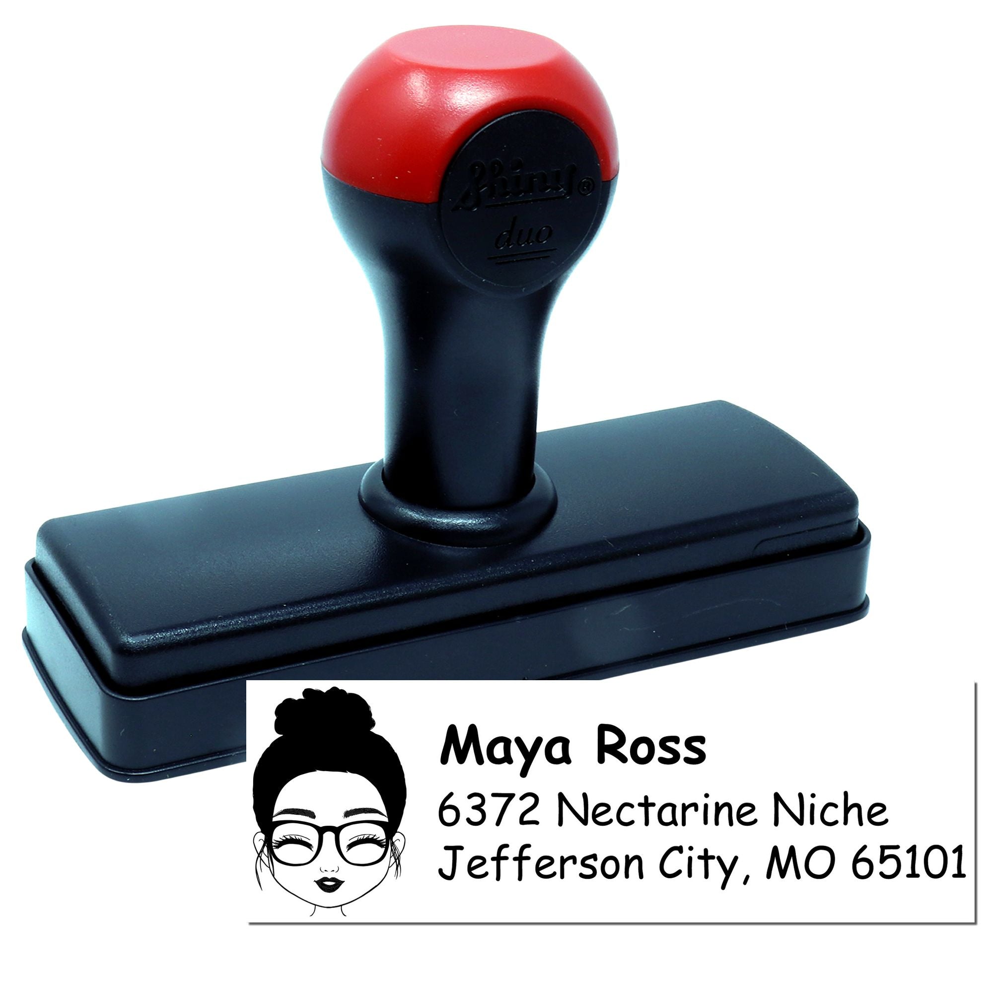 Personalized self-inking return address rubber stamp with custom name and mailing details for envelopes.