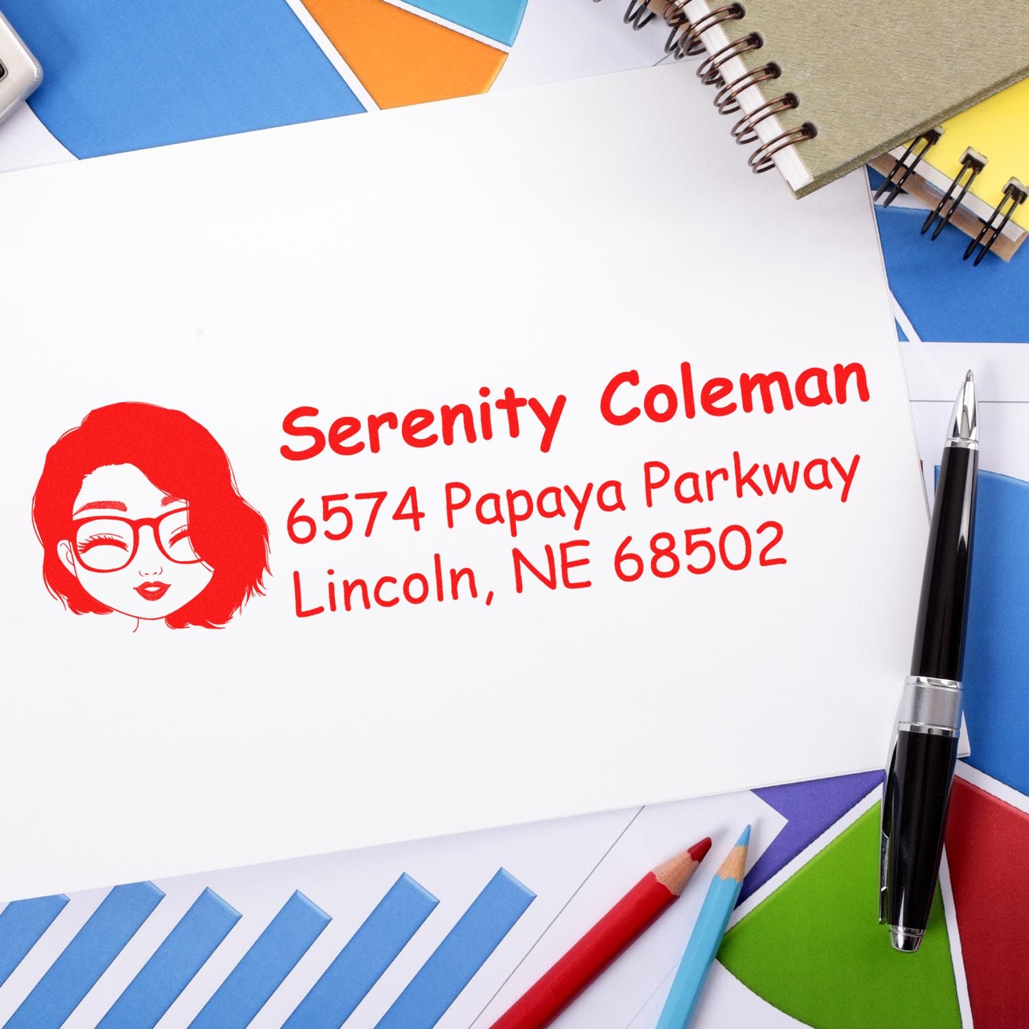 Personalized rubber address stamp with name, avatar logo, and Lincoln, NE return address on stationery