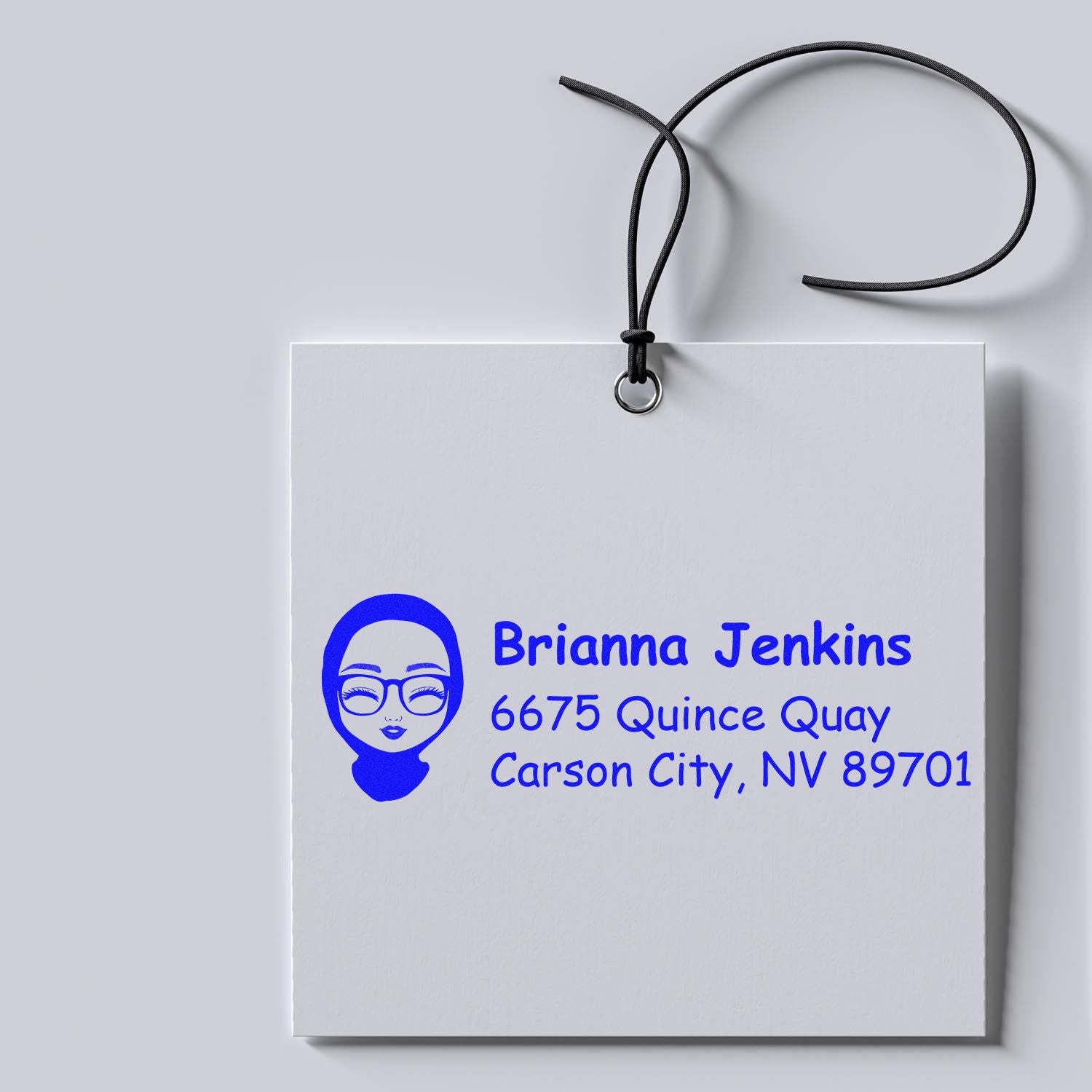 Custom return address rubber stamp with name, avatar logo, and Carson City, NV mailing address for personalized correspondence.