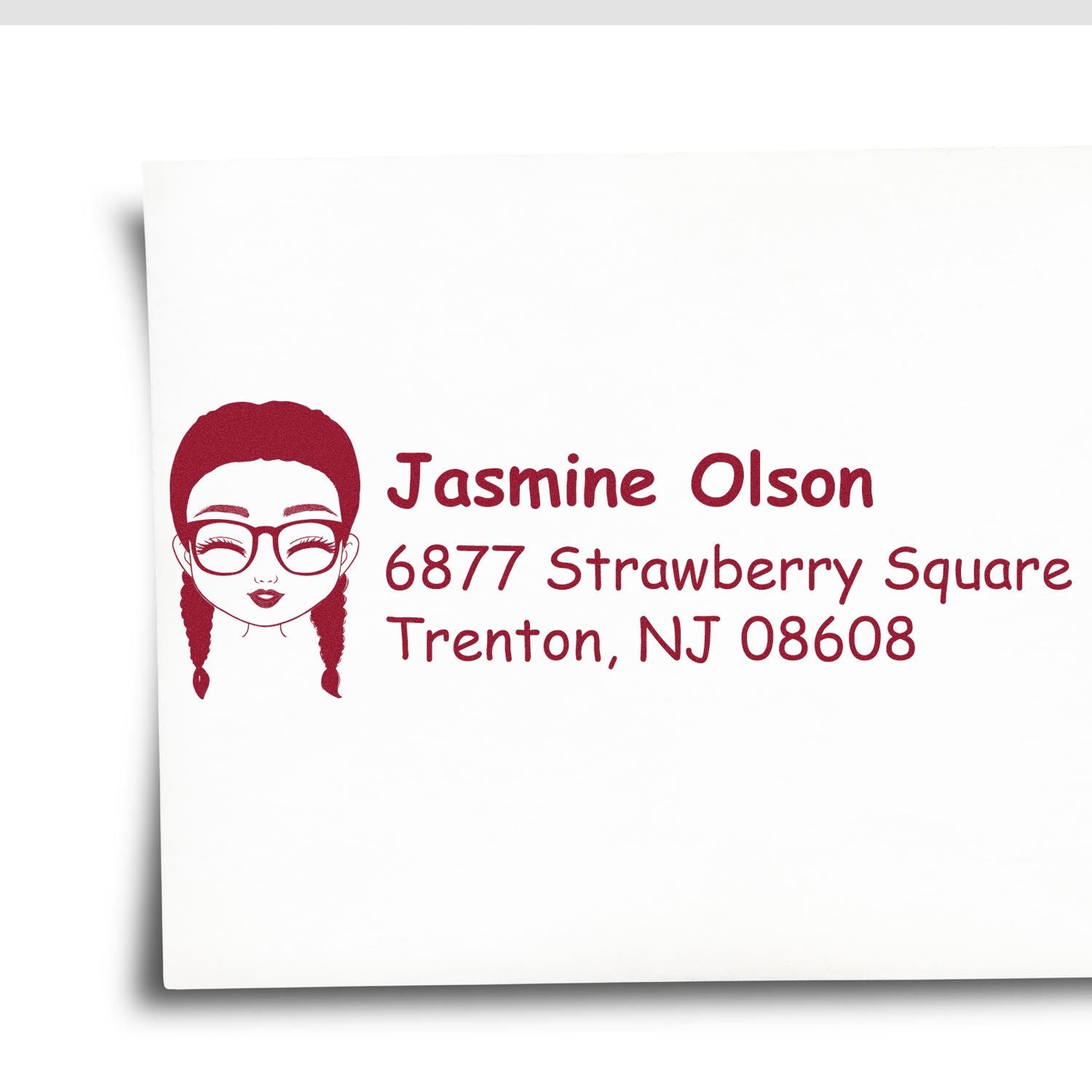 Custom return address rubber stamp with portrait, Jasmine Olson, 6877 Strawberry Square, Trenton, NJ 08608.