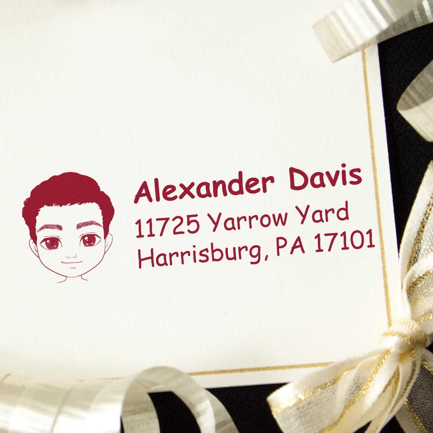 Personalized address rubber stamp with boy portrait, custom name, and Harrisburg, PA mailing address.