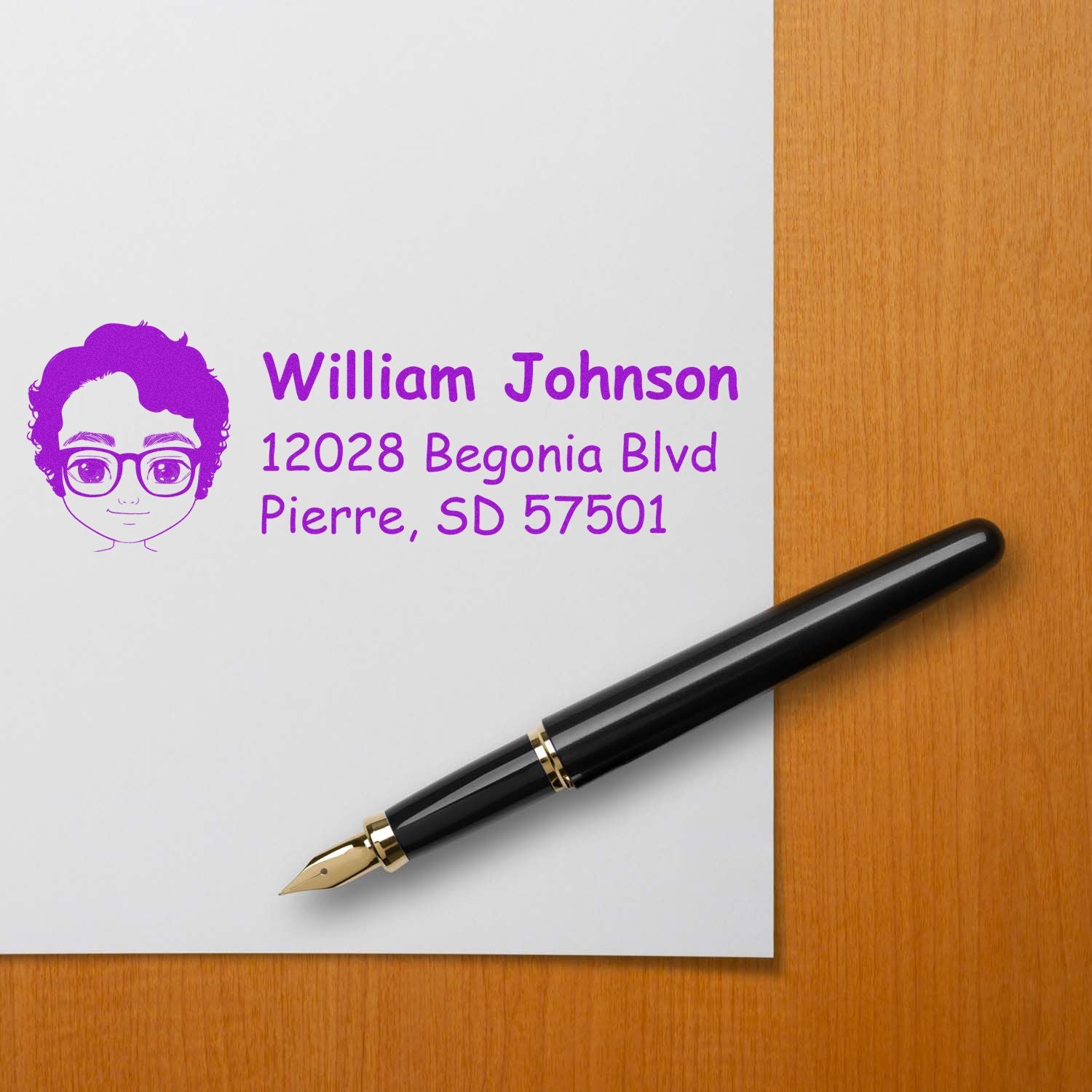 Custom rubber address stamp with portrait logo, name, and mailing address in purple ink for personalized stationery