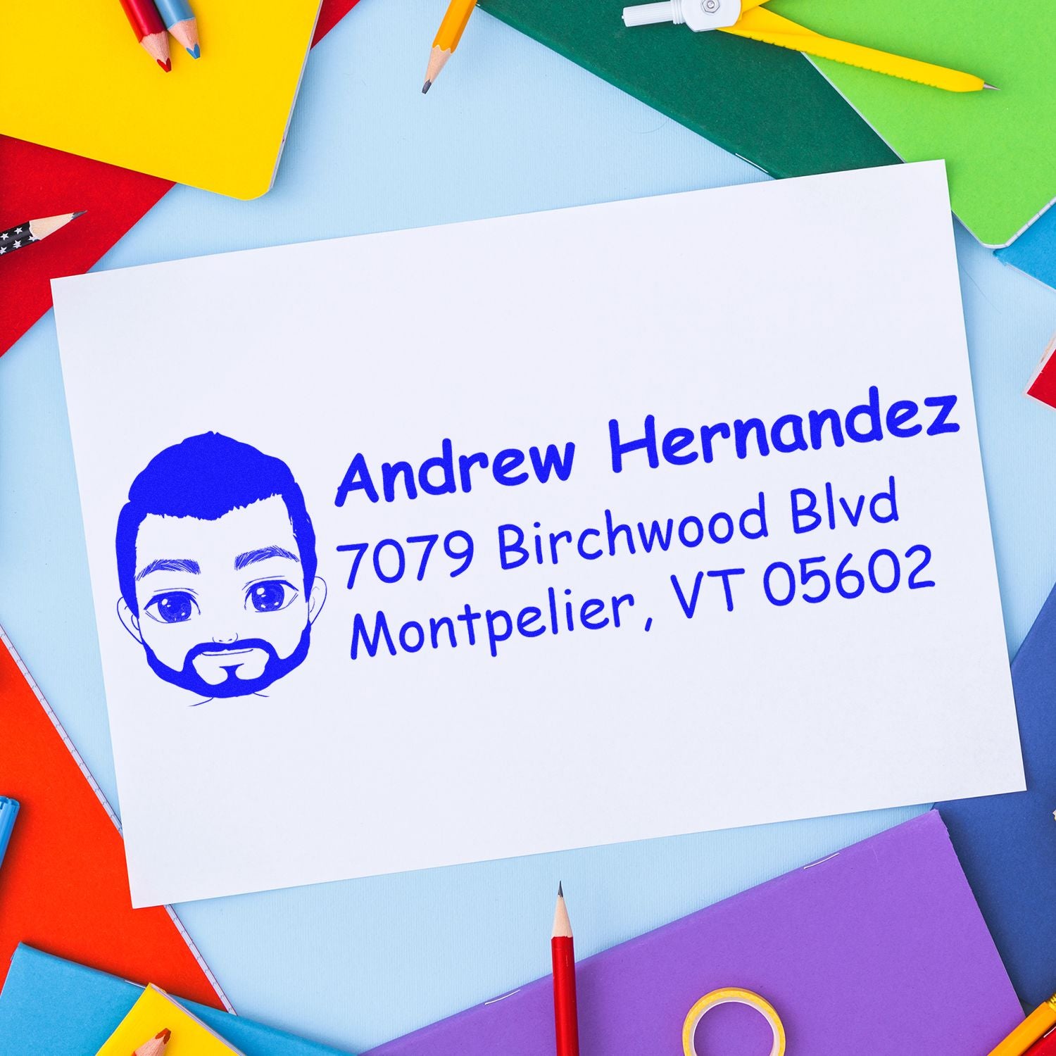 Custom return address rubber stamp with name, portrait, and mailing address for personalized envelopes.