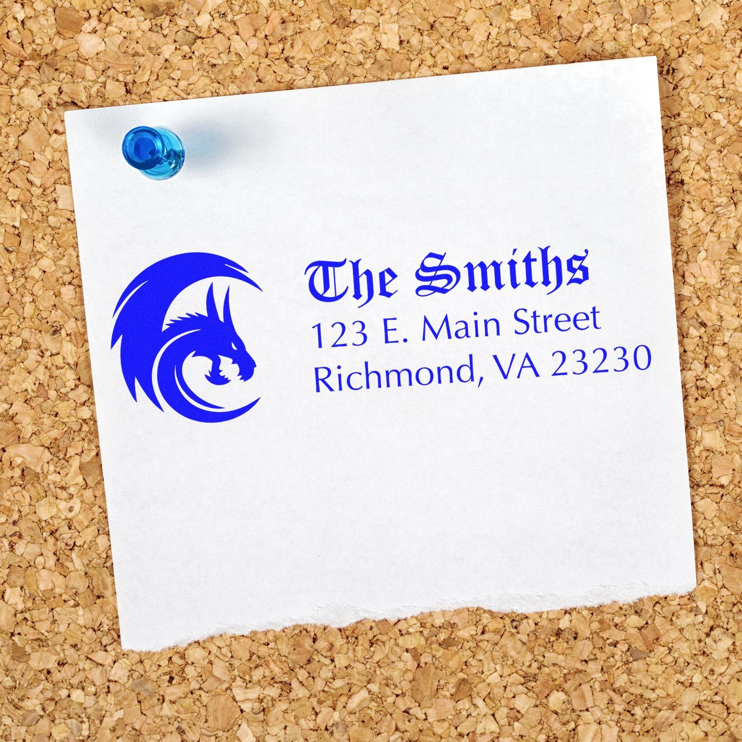 Custom rubber stamp imprint with dragon logo, The Smiths, and Richmond, VA return address on white paper.