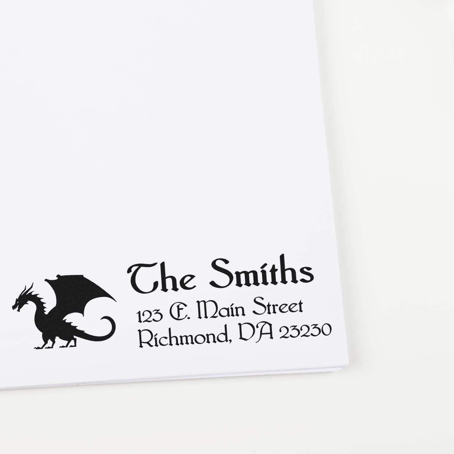 Custom address rubber stamp with dragon design for The Smiths, 123 E. Main Street, Richmond, VA 23230