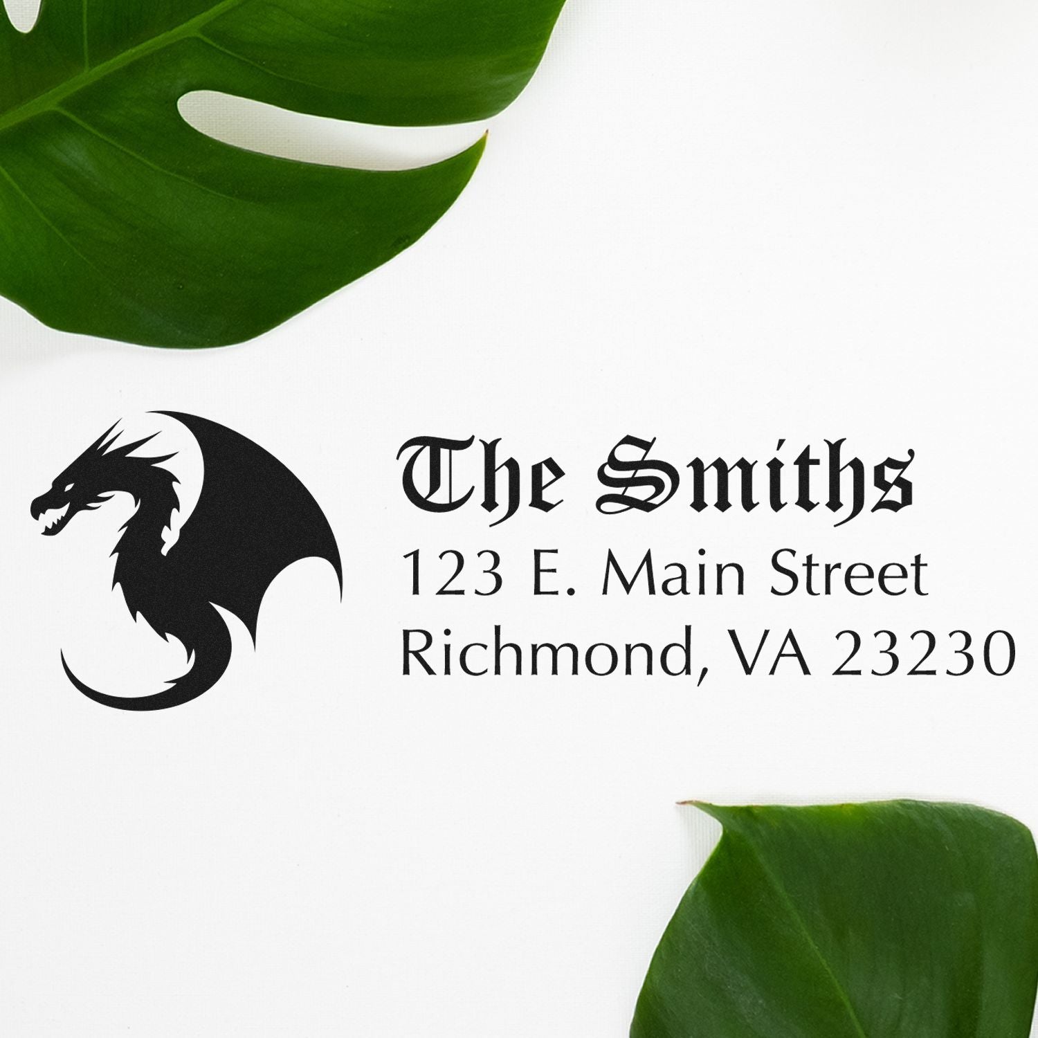 Custom rubber stamp with dragon logo and return address for The Smiths, Richmond, VA 23230.