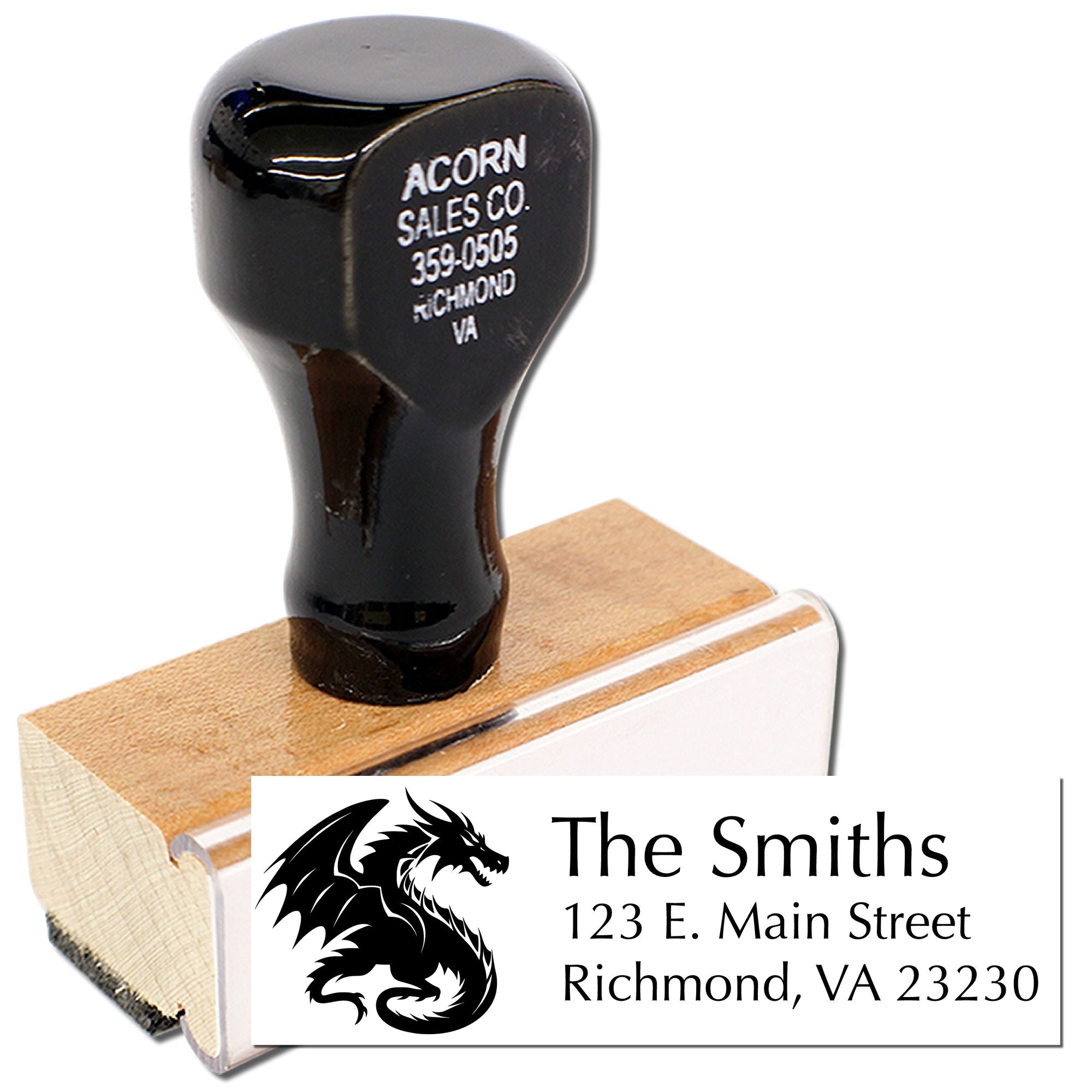 Personalized address rubber stamp with dragon logo and custom family name for mailing and business use.