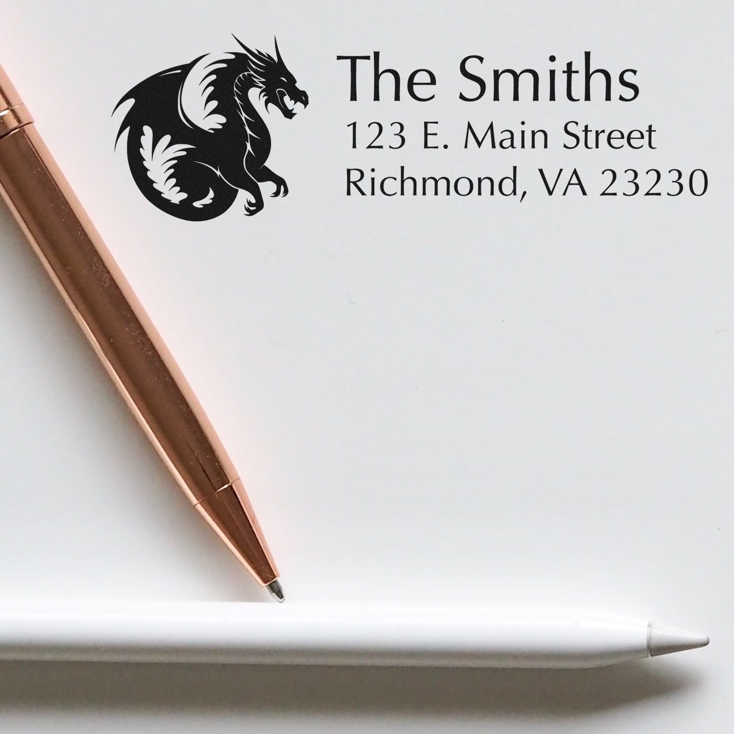 Custom return address rubber stamp with dragon monogram for The Smiths, 123 E. Main Street, Richmond, VA 23230.