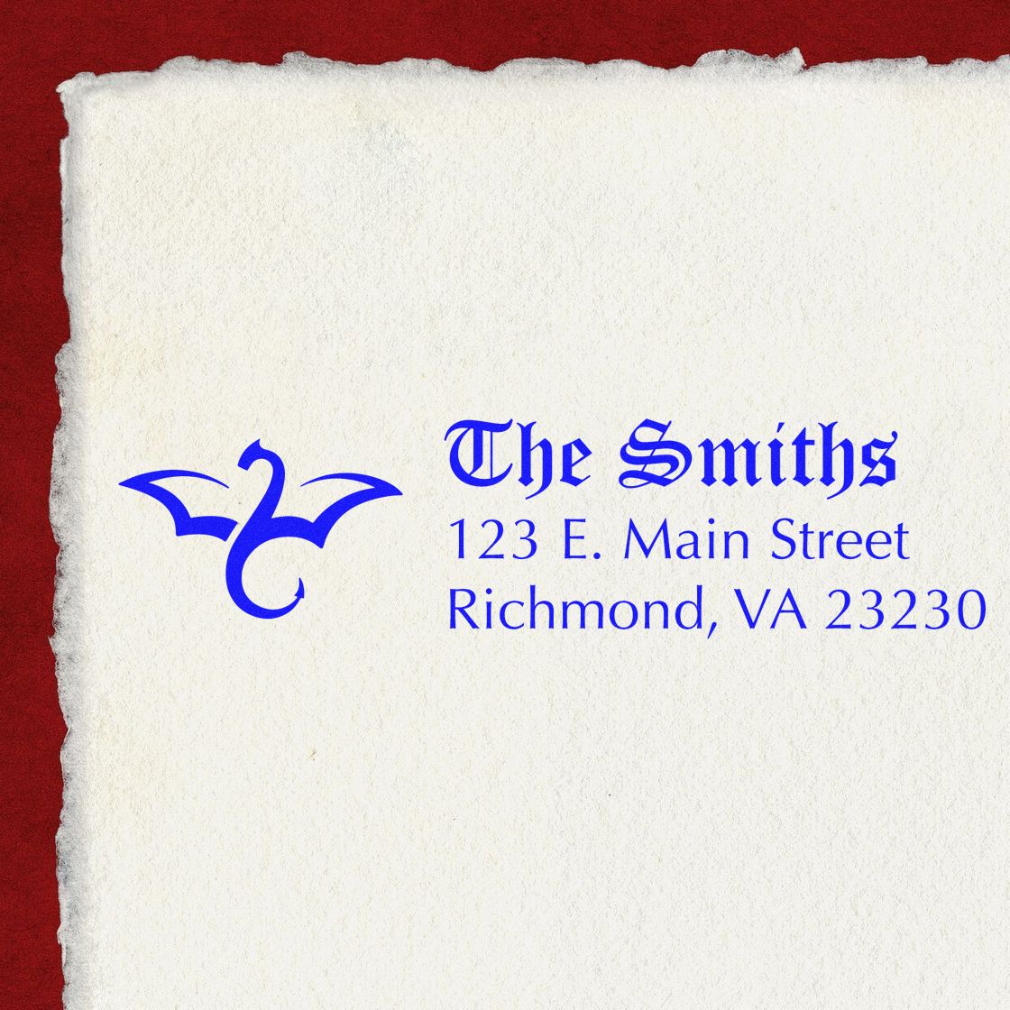 Custom rubber stamp design for The Smiths address stamp with decorative logo, 123 E. Main Street, Richmond, VA.