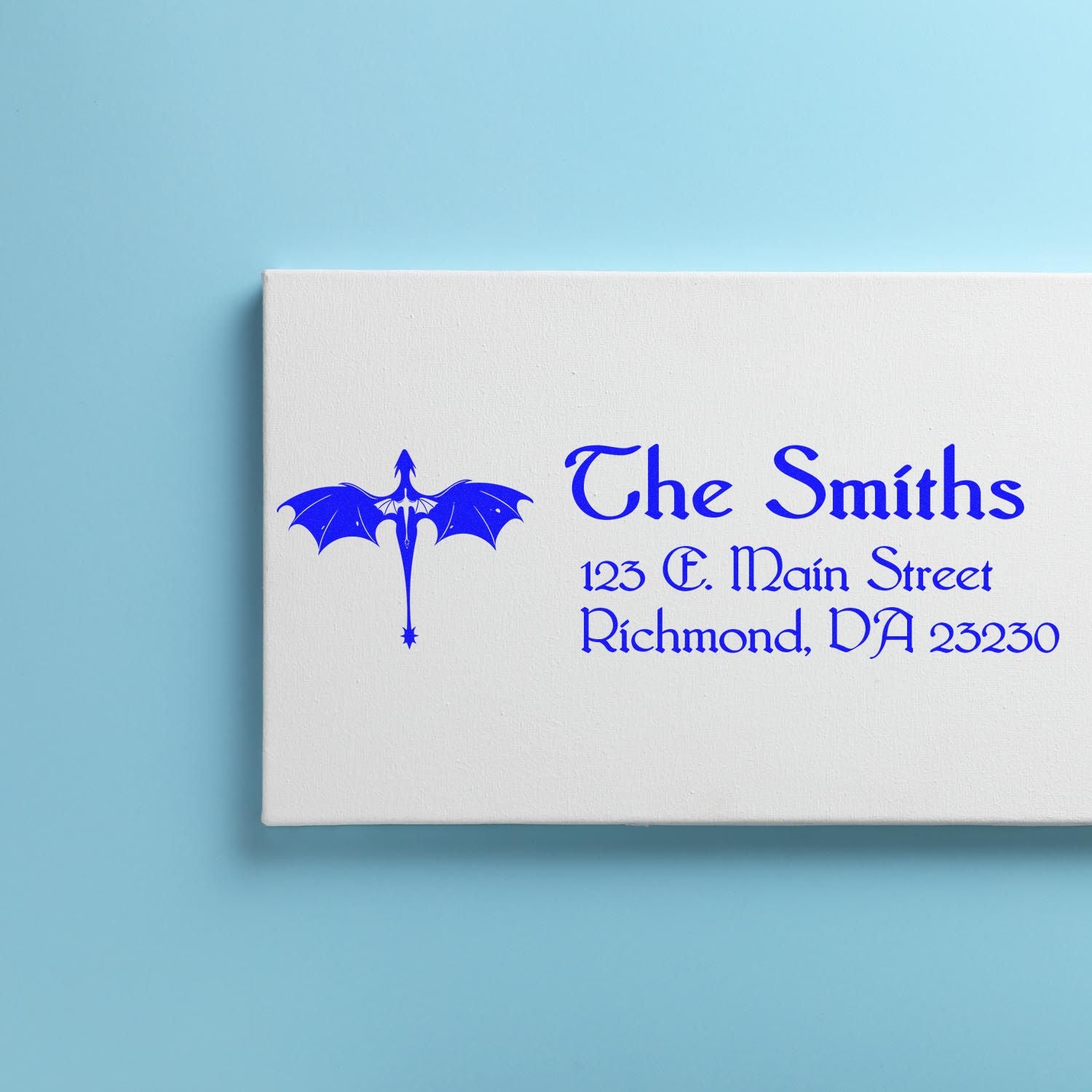 Personalized return address rubber stamp with dragon logo for The Smiths, showing name and Richmond, VA address.