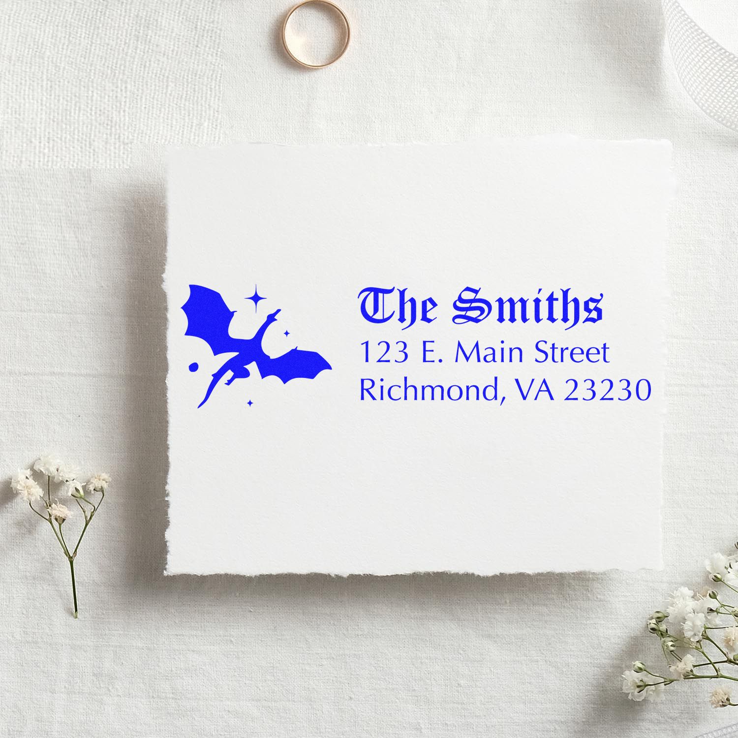 Custom rubber stamp for The Smiths address stamp with bat logo, gothic blue text, and Richmond, VA mailing details.